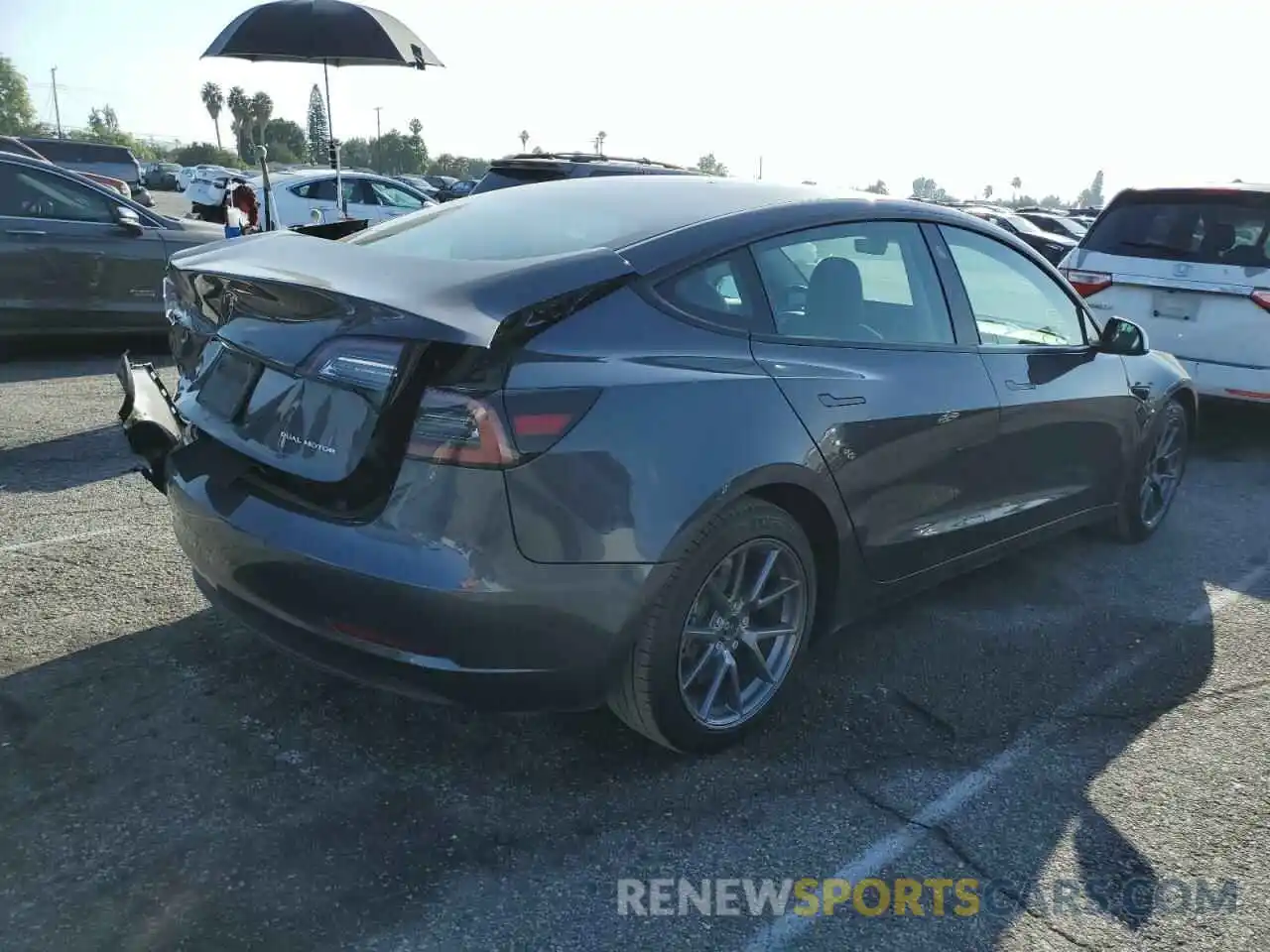 4 Photograph of a damaged car 5YJ3E1EB2MF006792 TESLA MODEL 3 2021