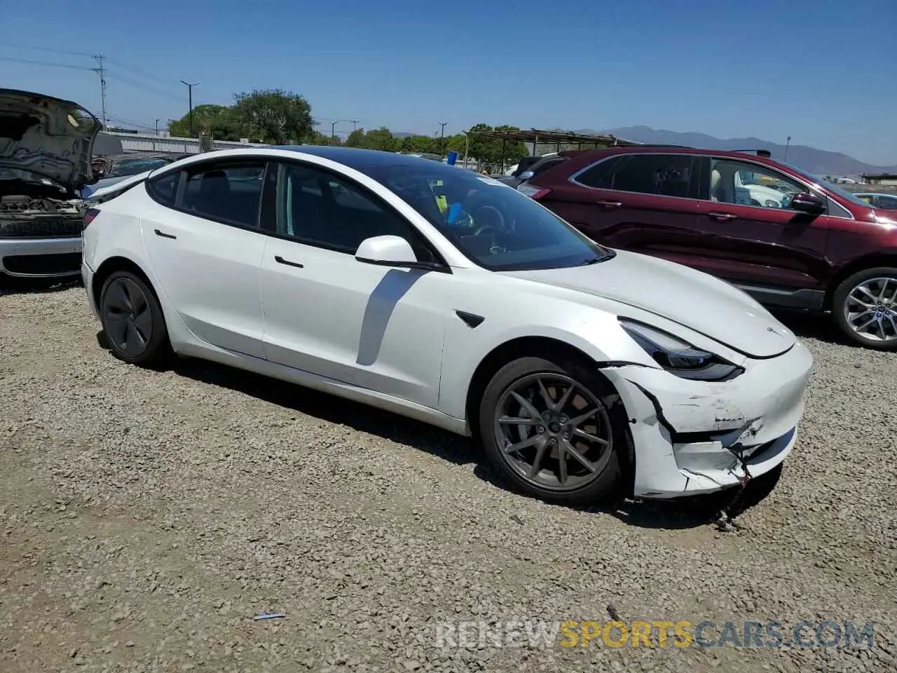 4 Photograph of a damaged car 5YJ3E1EB2MF015072 TESLA MODEL 3 2021