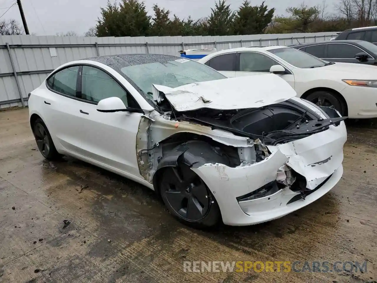 4 Photograph of a damaged car 5YJ3E1EB2MF033474 TESLA MODEL 3 2021