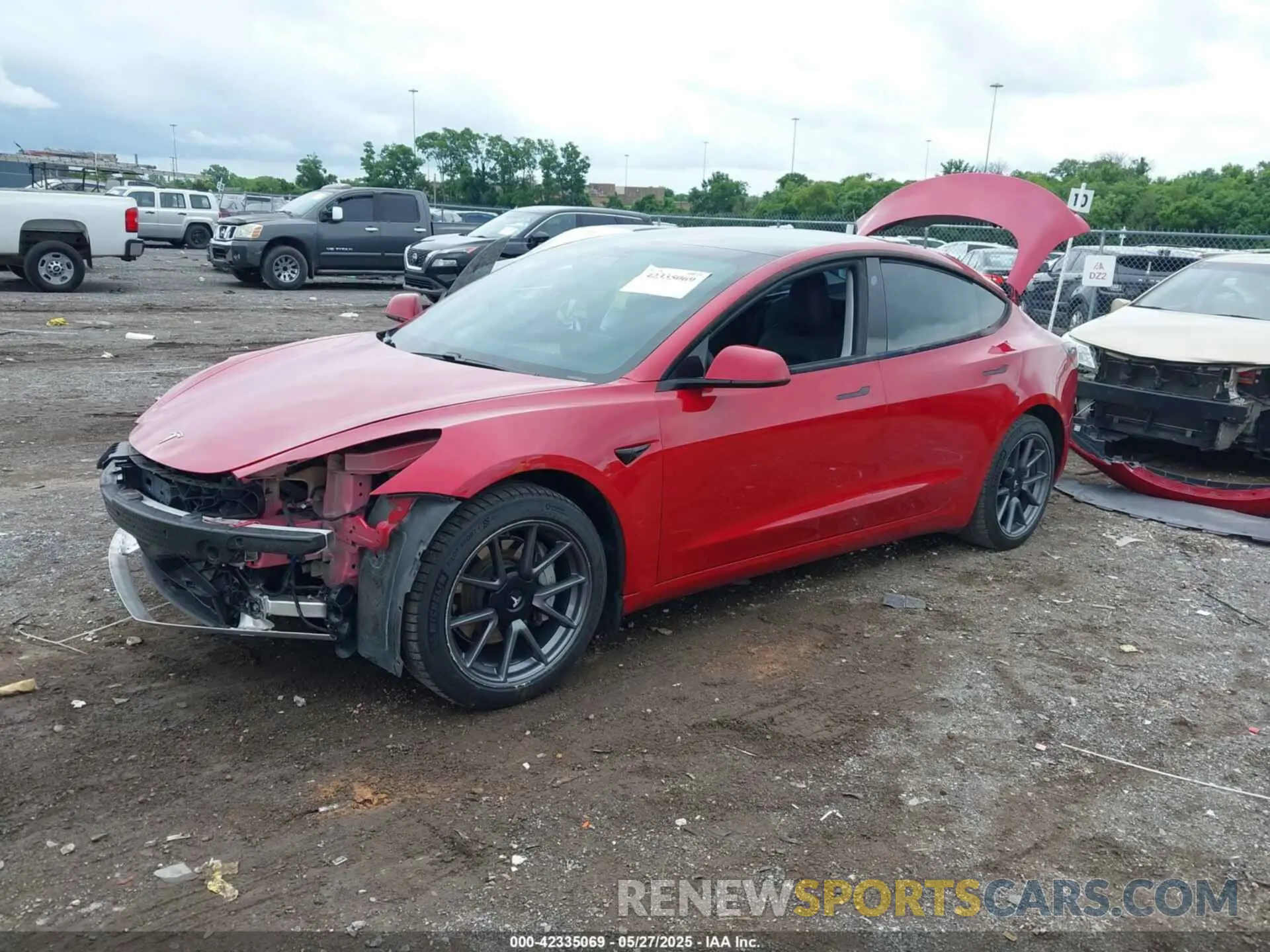 2 Photograph of a damaged car 5YJ3E1EB2MF061663 TESLA MODEL 3 2021