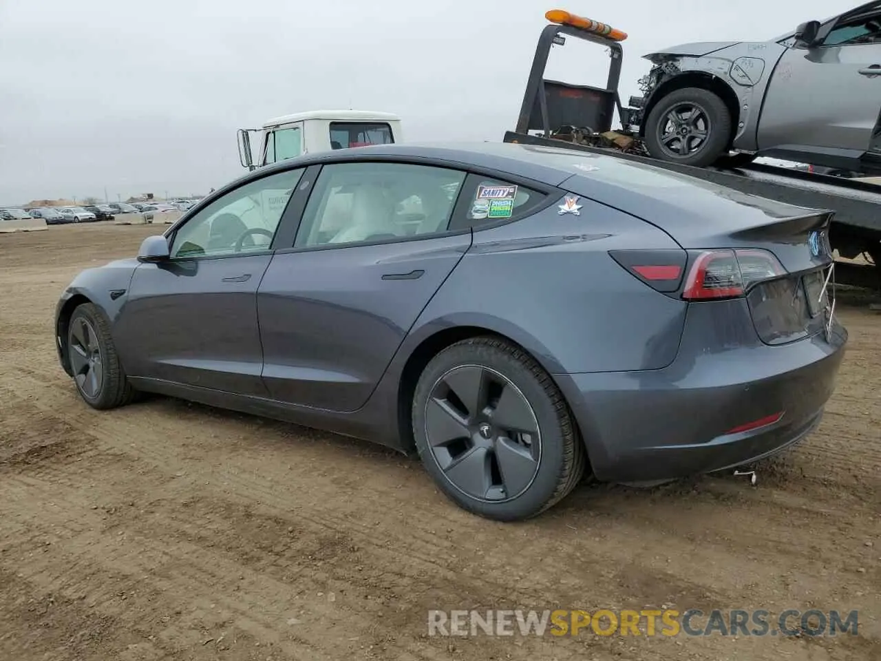 2 Photograph of a damaged car 5YJ3E1EB2MF852663 TESLA MODEL 3 2021