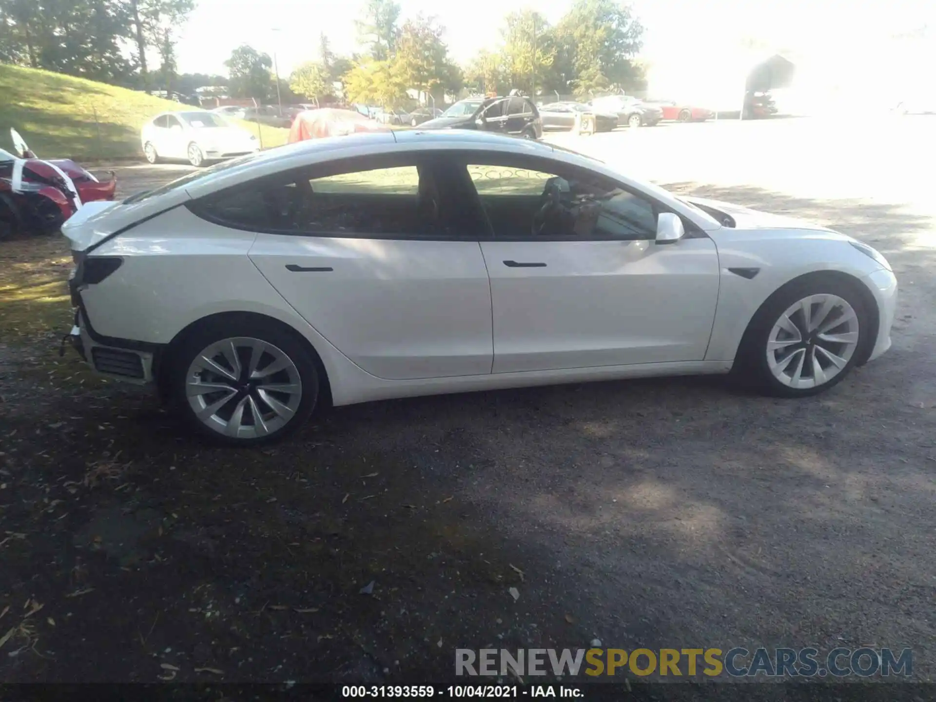 4 Photograph of a damaged car 5YJ3E1EB2MF855742 TESLA MODEL 3 2021