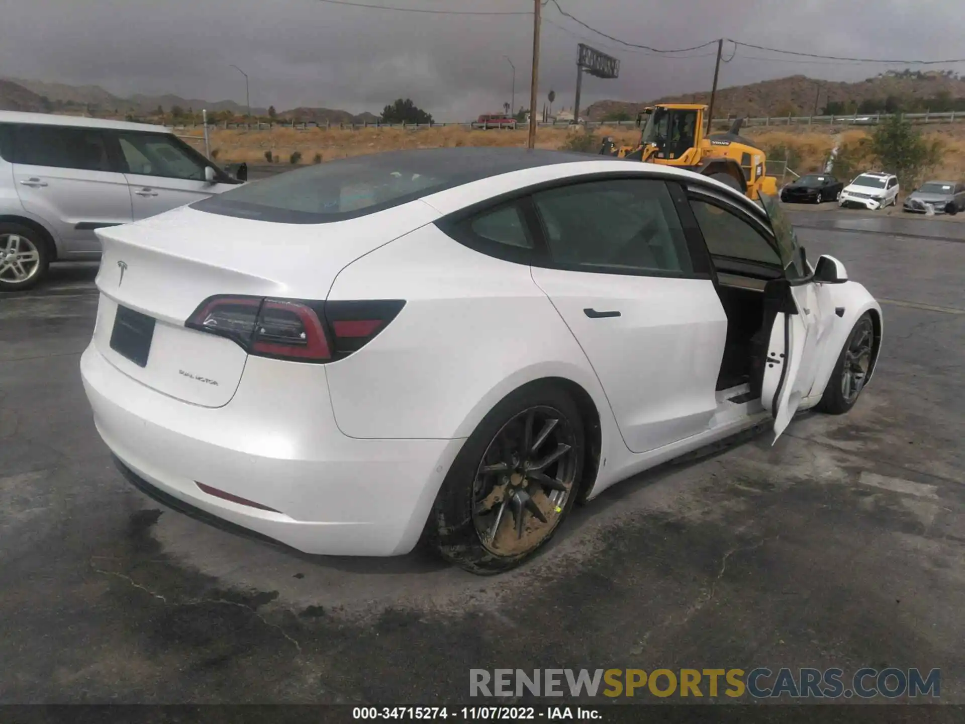 4 Photograph of a damaged car 5YJ3E1EB2MF872847 TESLA MODEL 3 2021