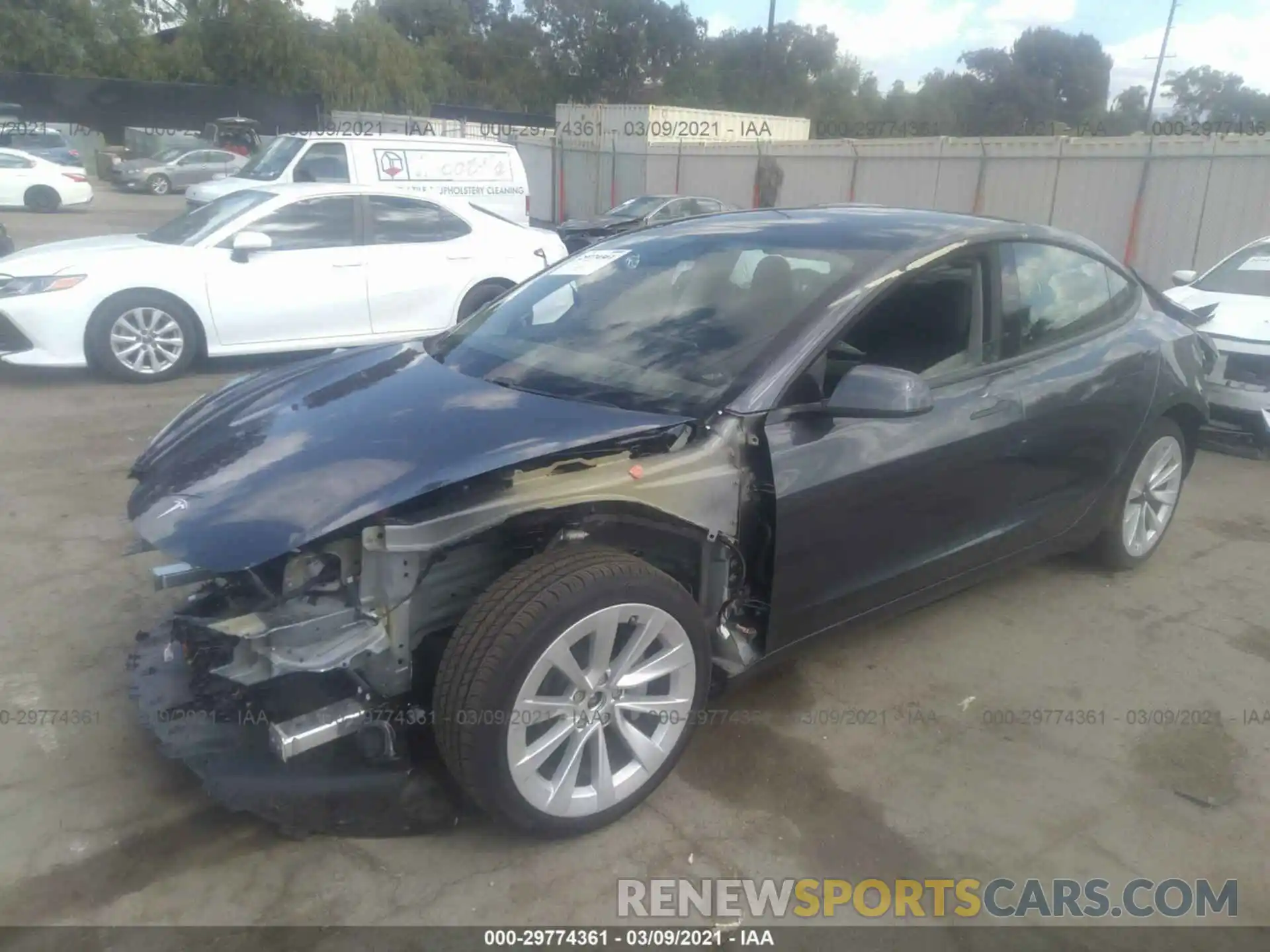 2 Photograph of a damaged car 5YJ3E1EB2MF875781 TESLA MODEL 3 2021