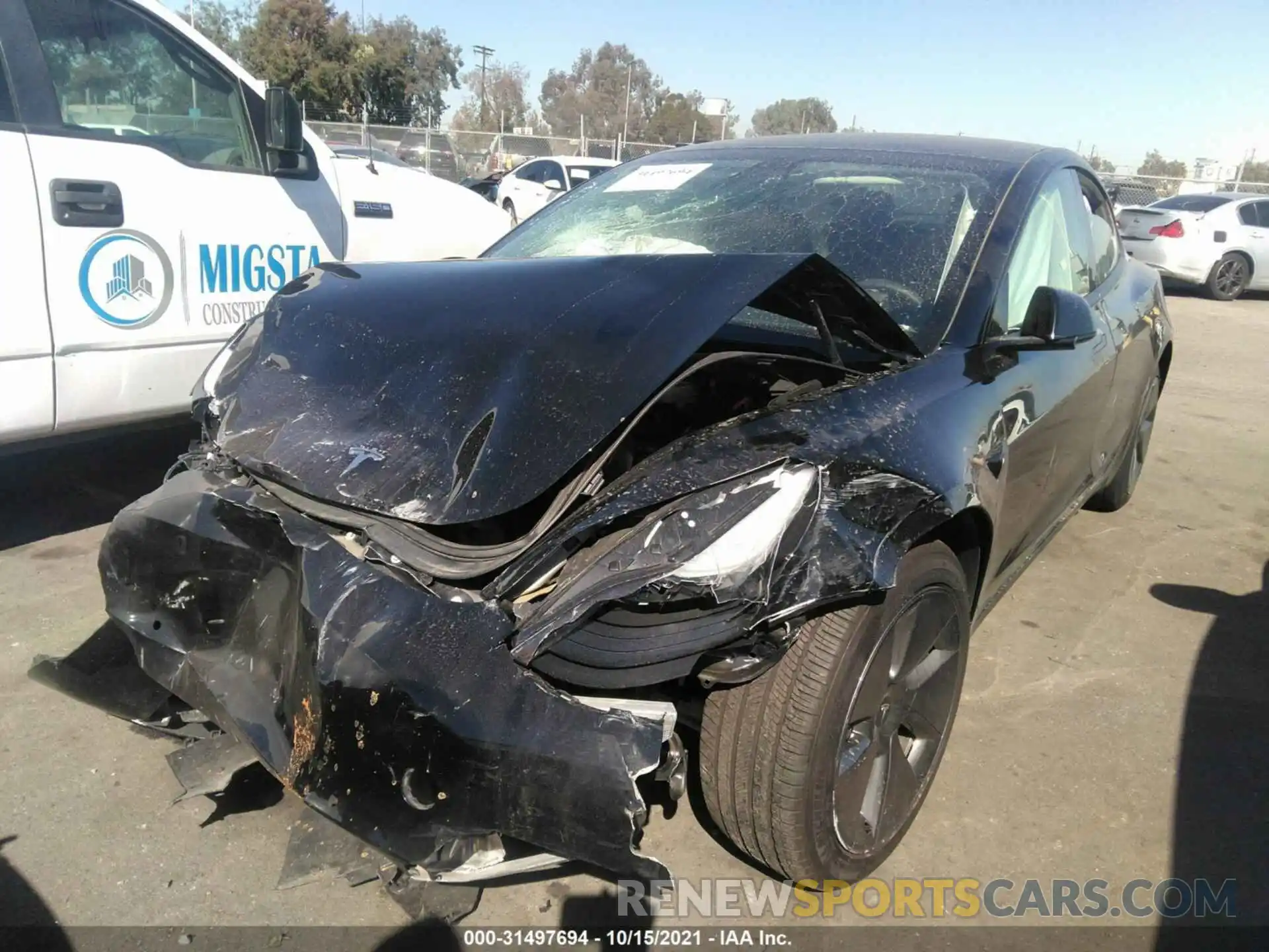 2 Photograph of a damaged car 5YJ3E1EB2MF877157 TESLA MODEL 3 2021