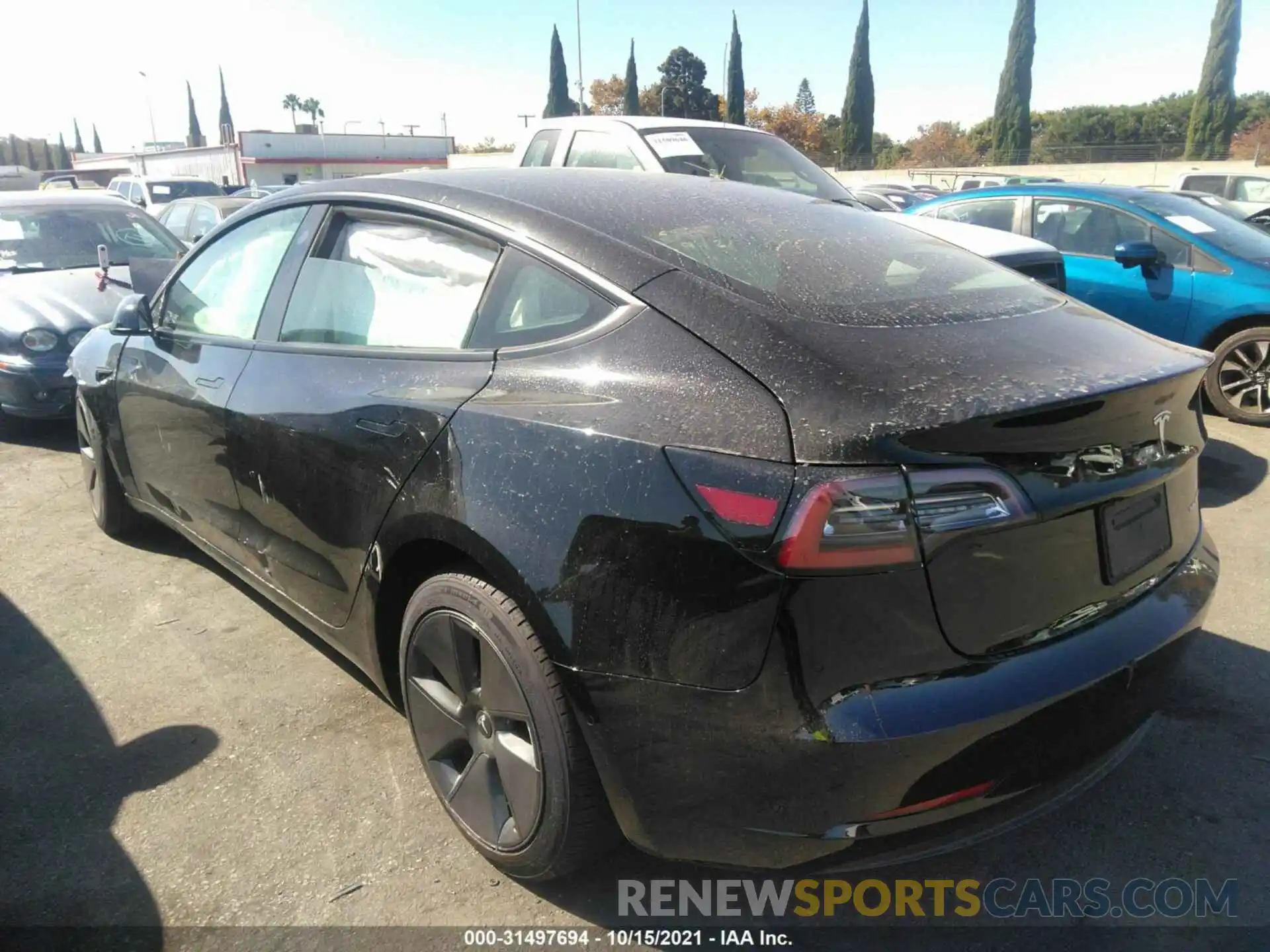 3 Photograph of a damaged car 5YJ3E1EB2MF877157 TESLA MODEL 3 2021