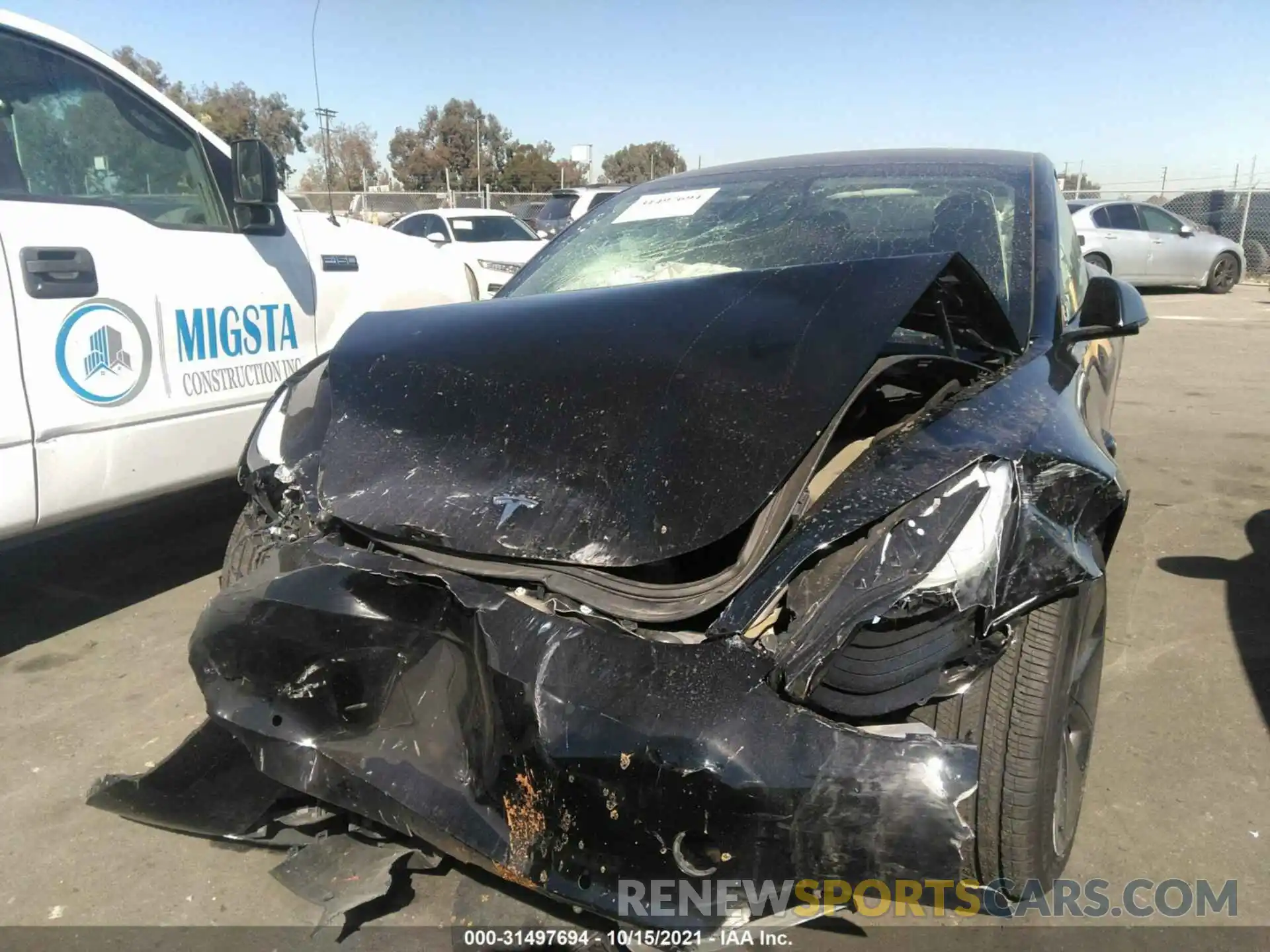 6 Photograph of a damaged car 5YJ3E1EB2MF877157 TESLA MODEL 3 2021