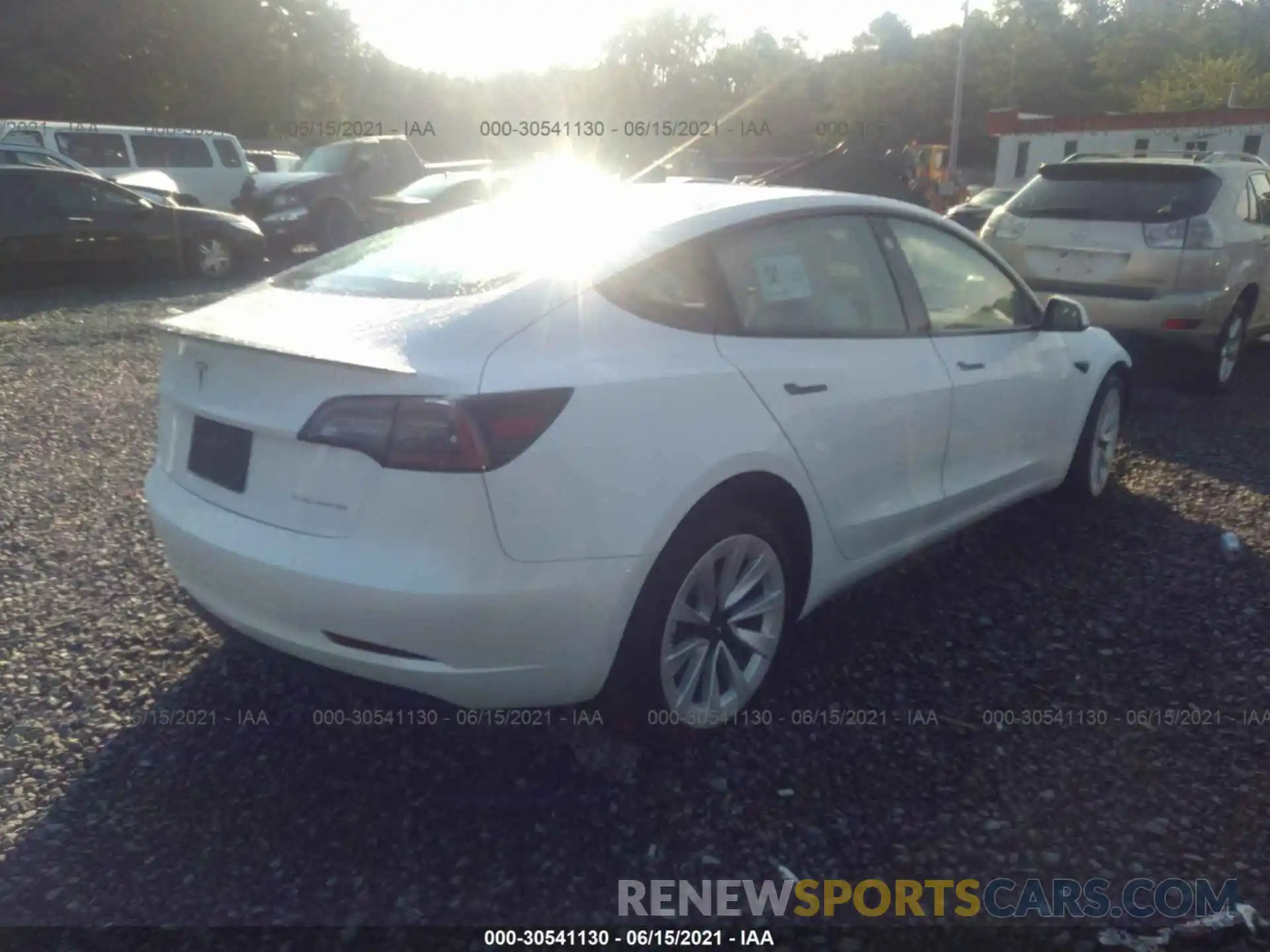 4 Photograph of a damaged car 5YJ3E1EB2MF903451 TESLA MODEL 3 2021