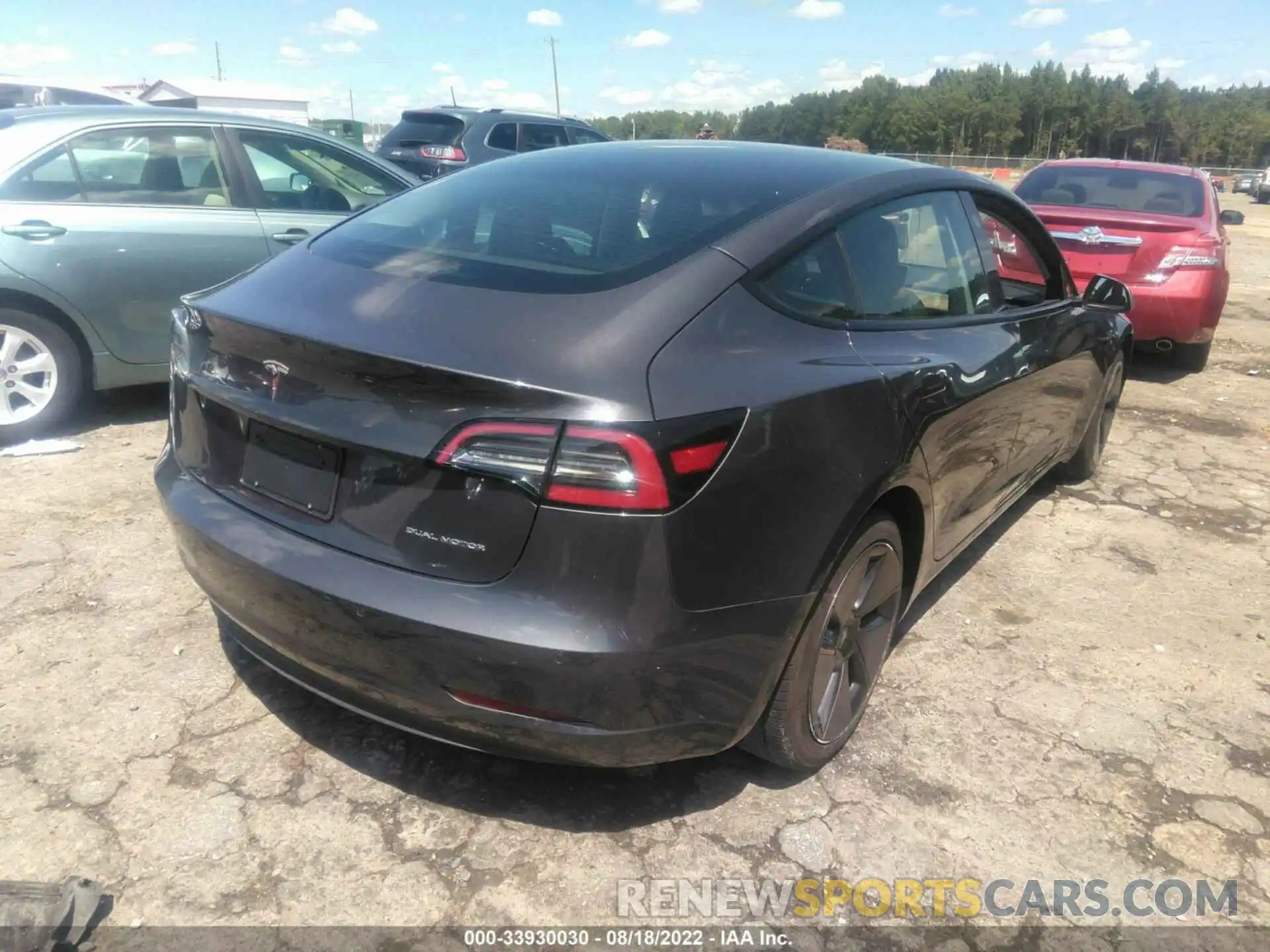 4 Photograph of a damaged car 5YJ3E1EB2MF974407 TESLA MODEL 3 2021