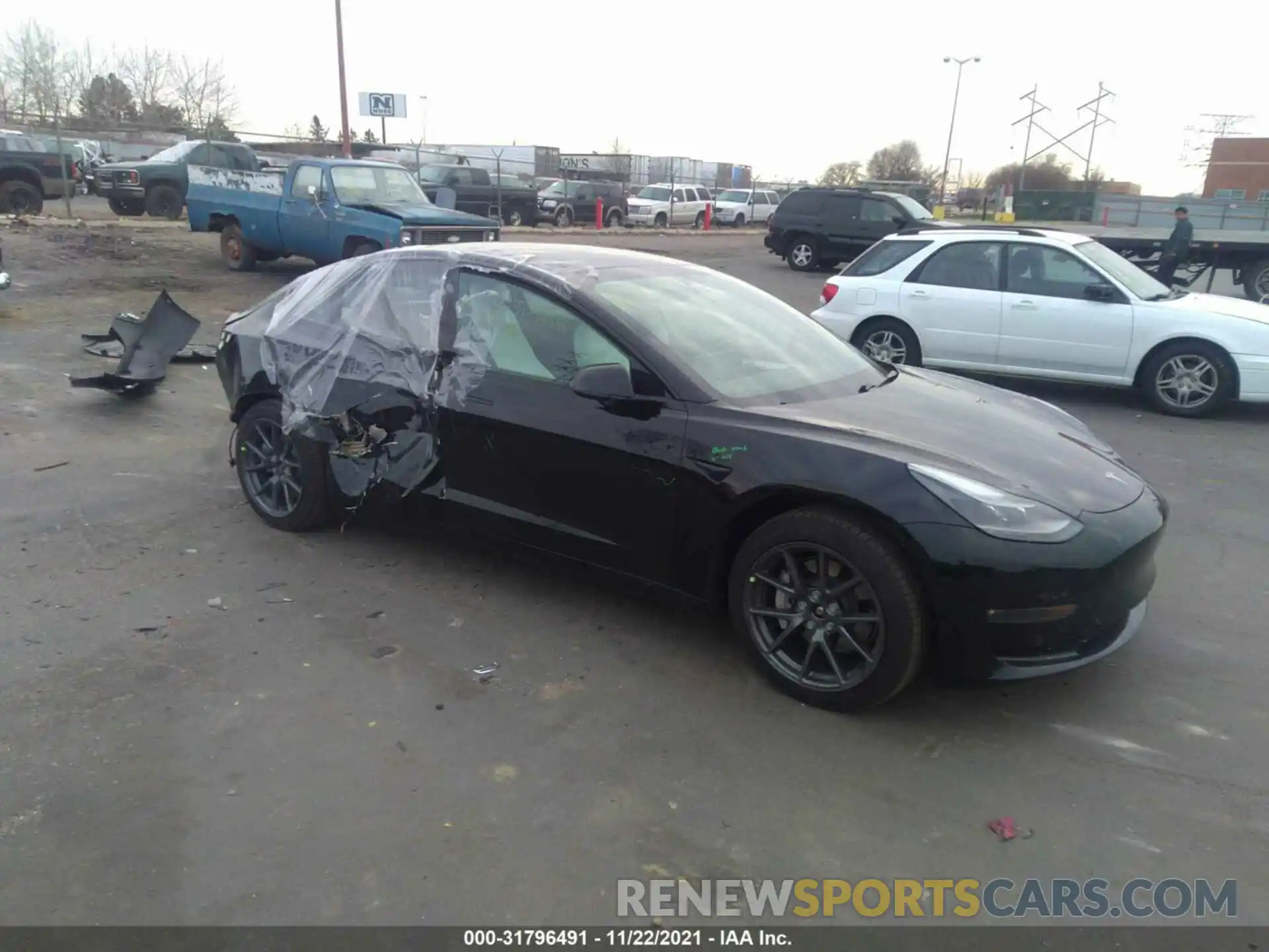 1 Photograph of a damaged car 5YJ3E1EB2MF975640 TESLA MODEL 3 2021