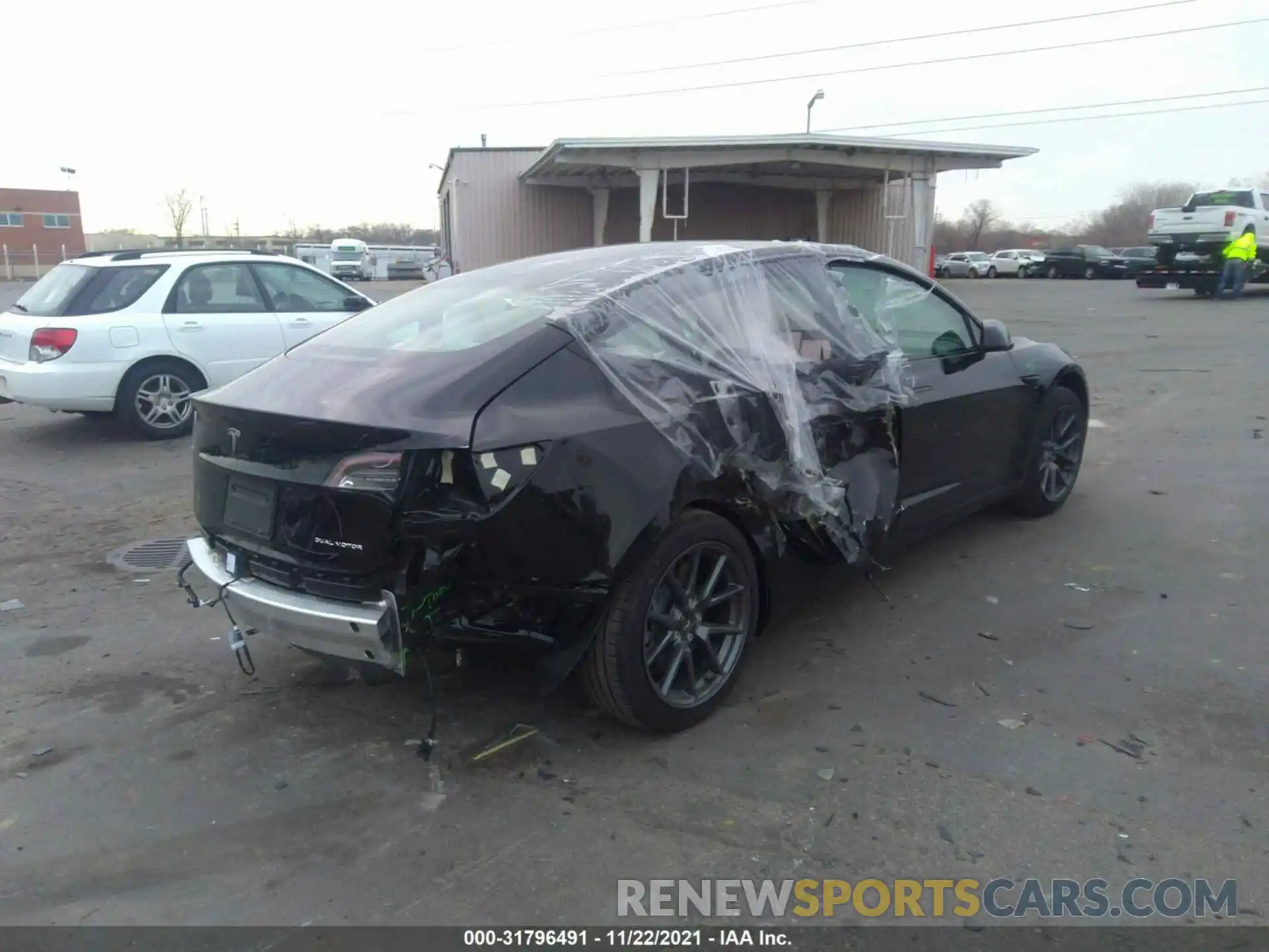 6 Photograph of a damaged car 5YJ3E1EB2MF975640 TESLA MODEL 3 2021