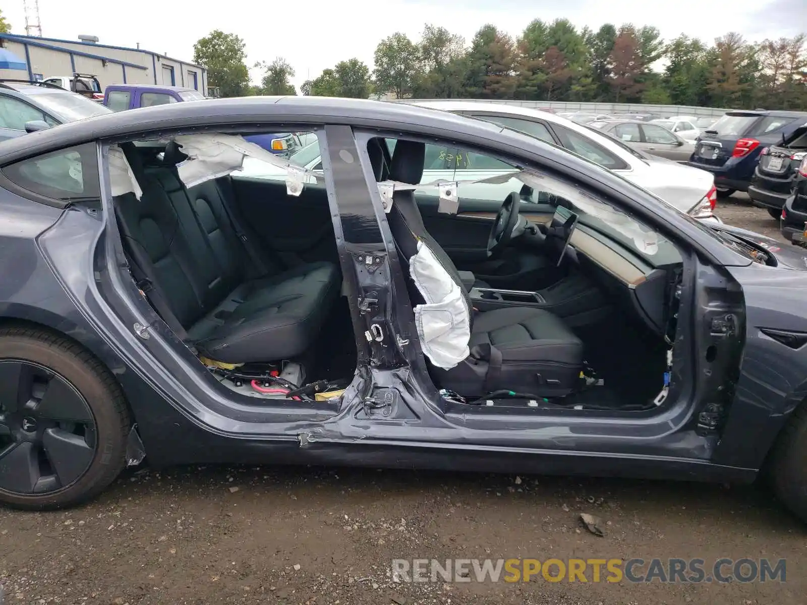 9 Photograph of a damaged car 5YJ3E1EB2MF983219 TESLA MODEL 3 2021