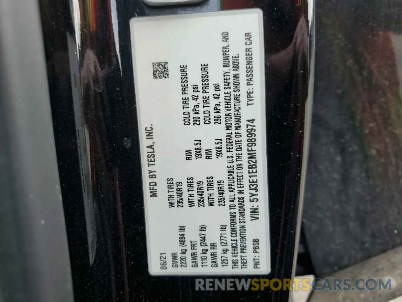 12 Photograph of a damaged car 5YJ3E1EB2MF989974 TESLA MODEL 3 2021