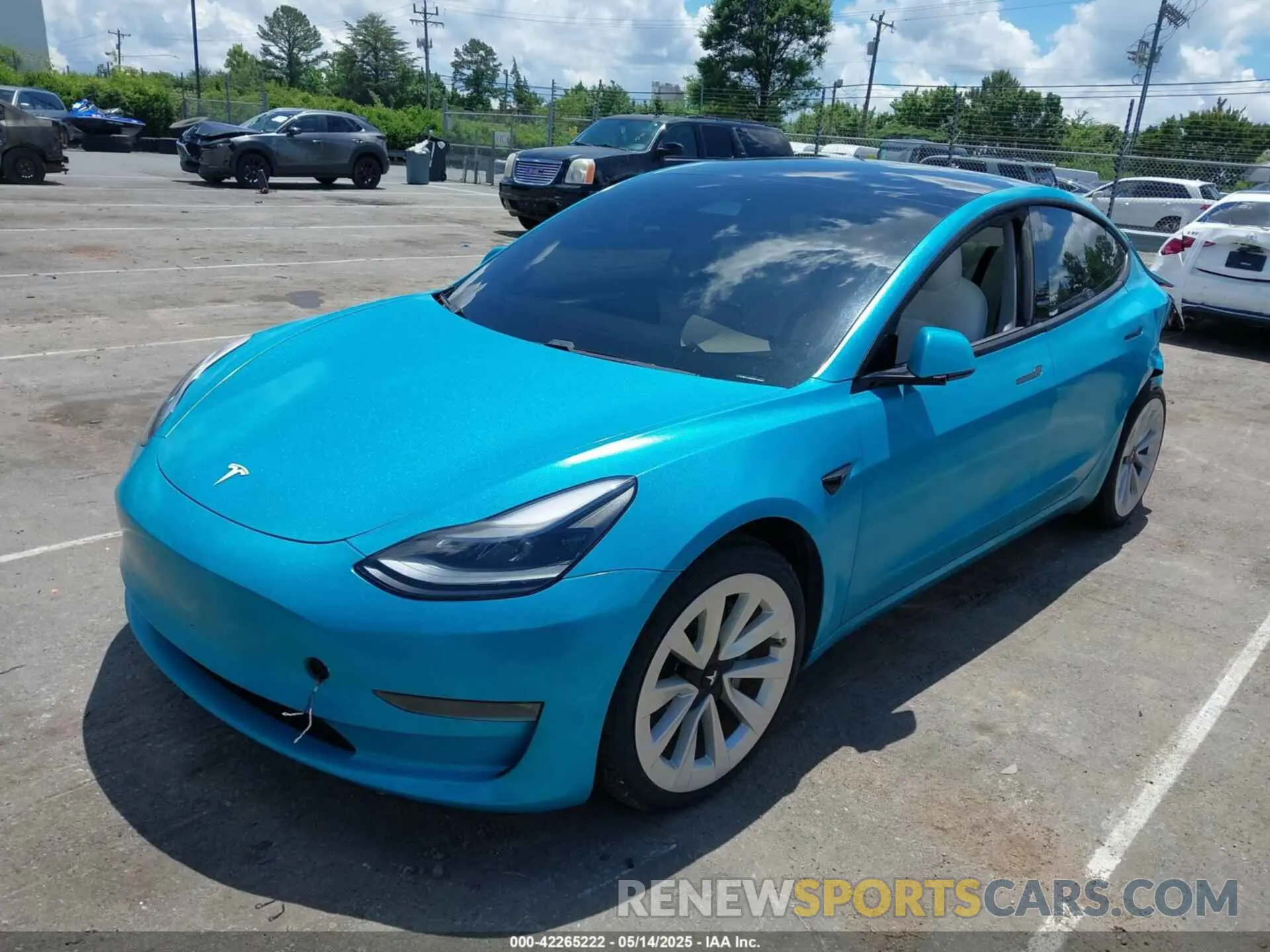 2 Photograph of a damaged car 5YJ3E1EB2MF990302 TESLA MODEL 3 2021