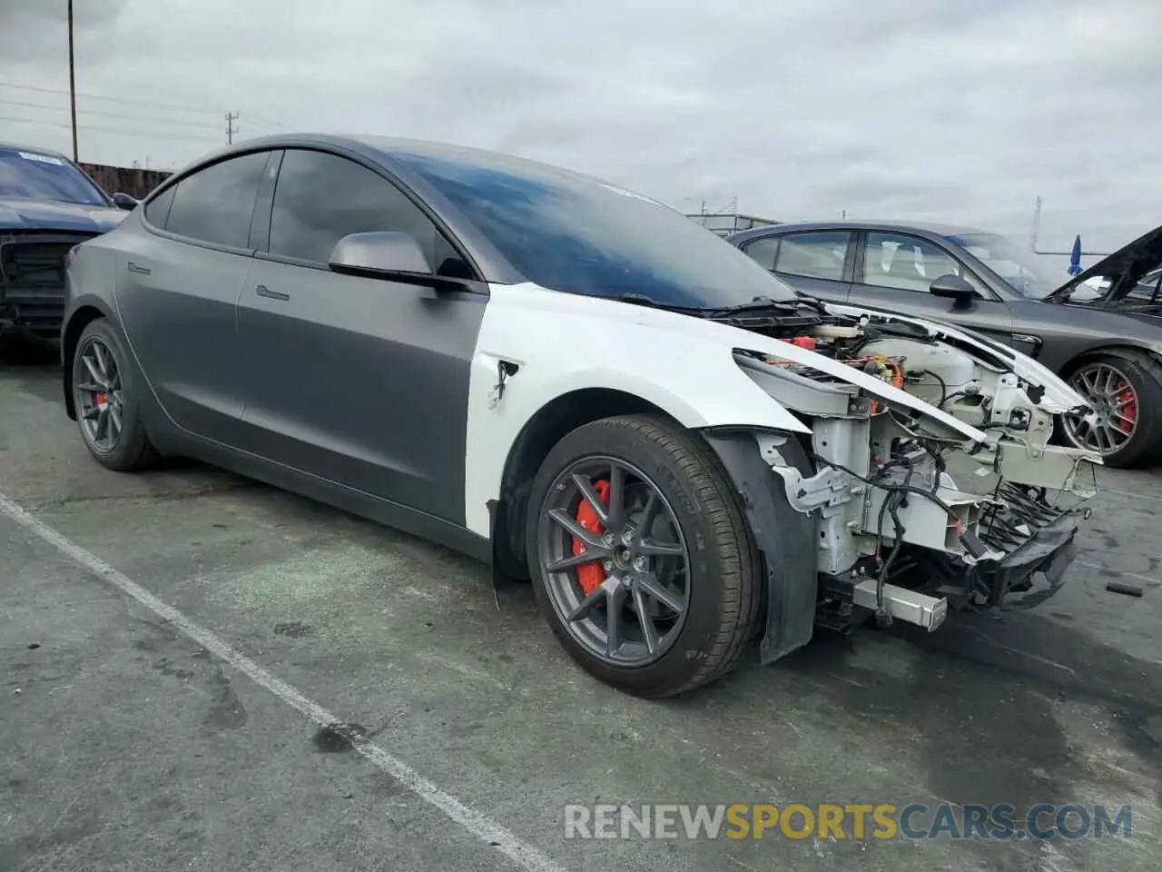 4 Photograph of a damaged car 5YJ3E1EB3MF003786 TESLA MODEL 3 2021