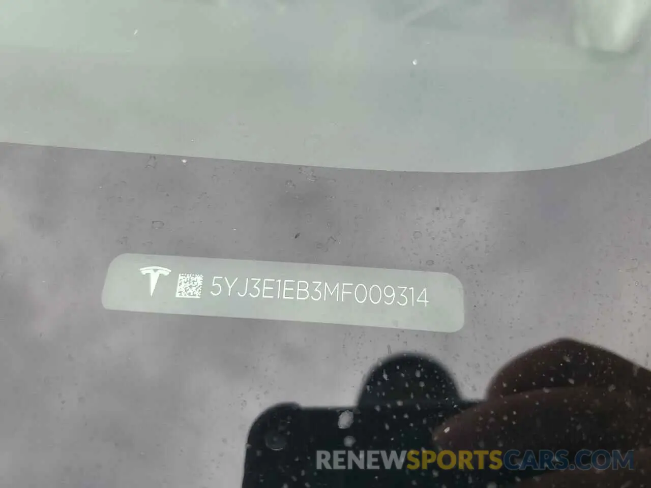 12 Photograph of a damaged car 5YJ3E1EB3MF009314 TESLA MODEL 3 2021