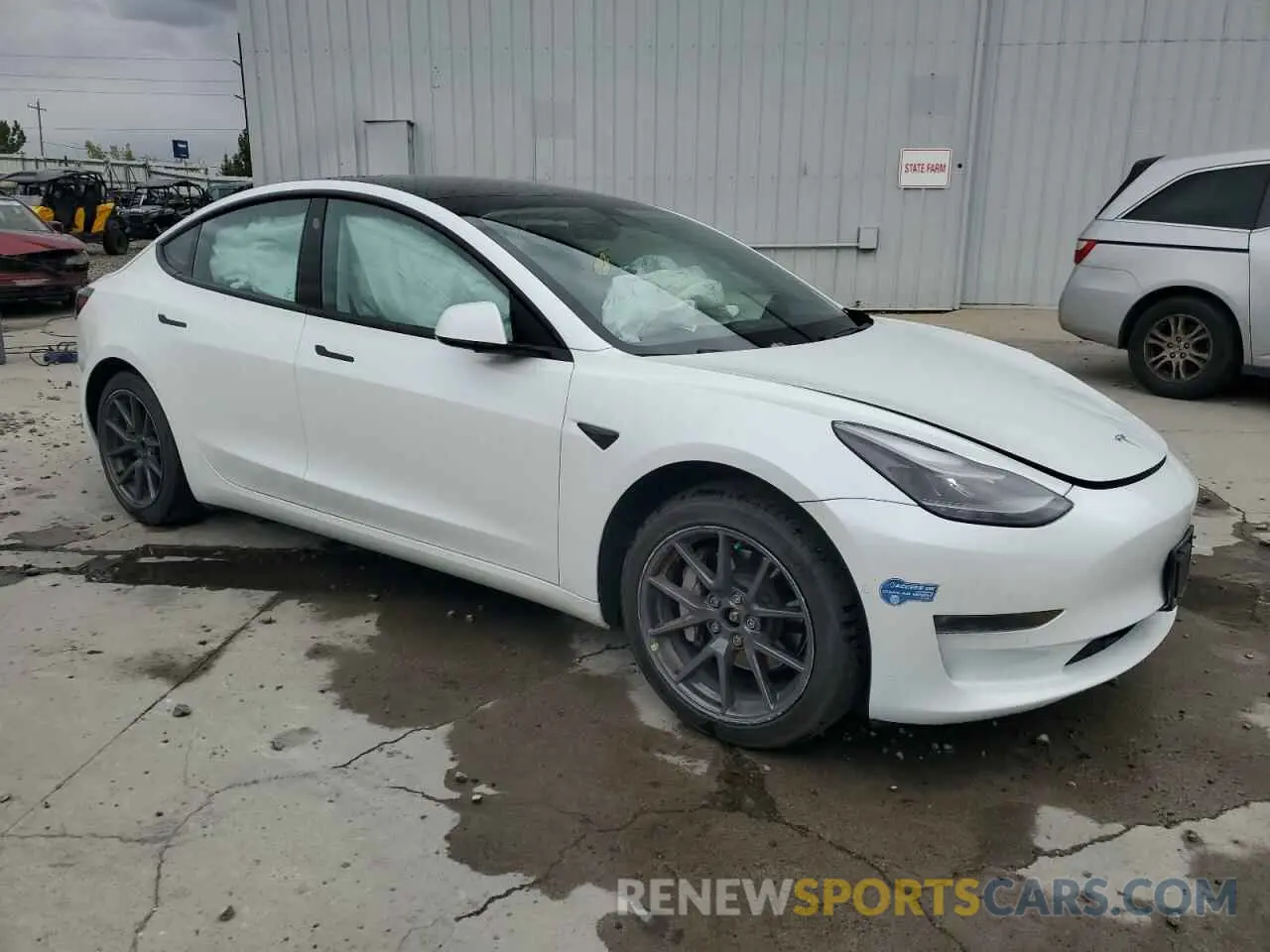 4 Photograph of a damaged car 5YJ3E1EB3MF009314 TESLA MODEL 3 2021