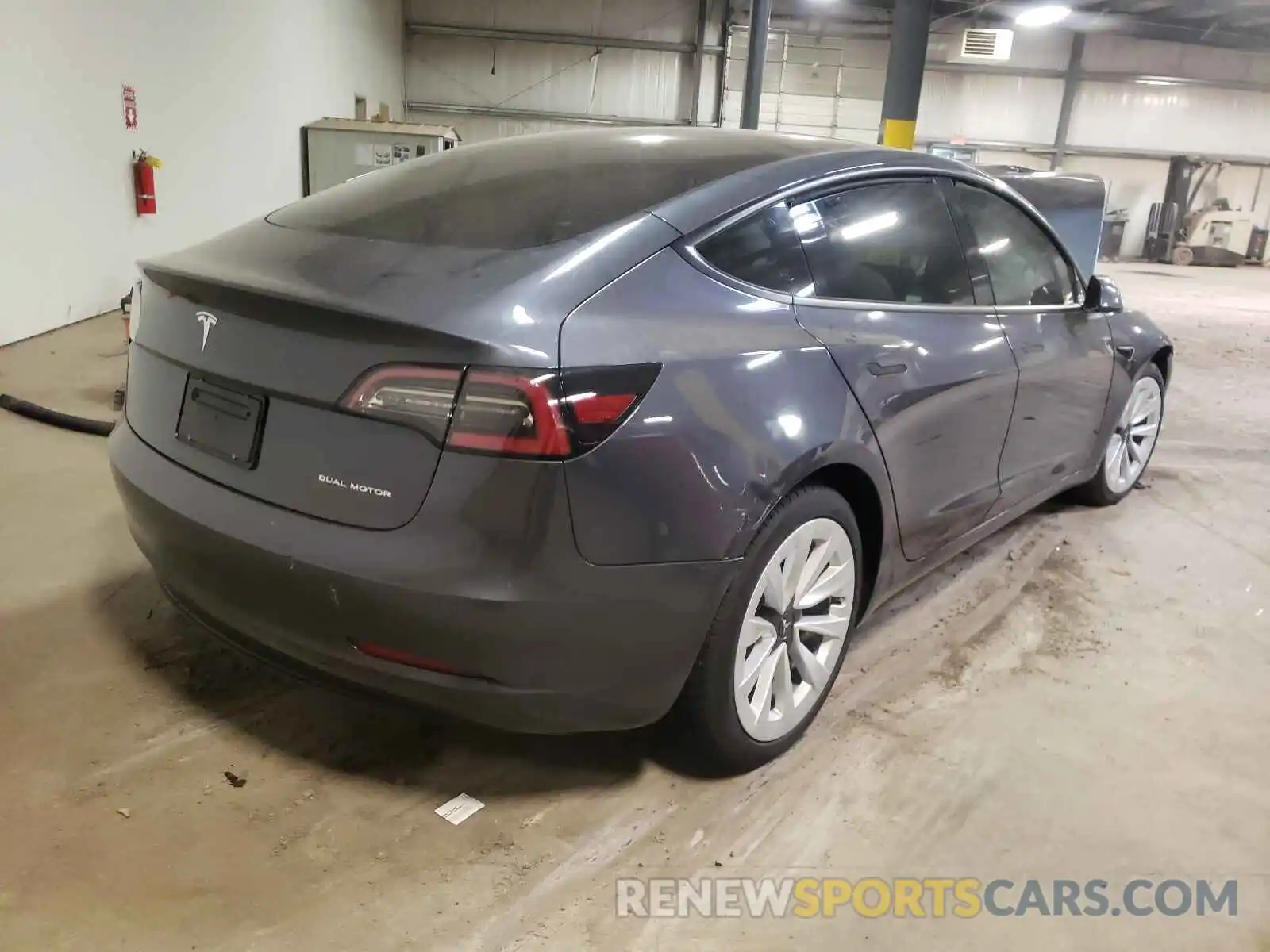 4 Photograph of a damaged car 5YJ3E1EB3MF015601 TESLA MODEL 3 2021