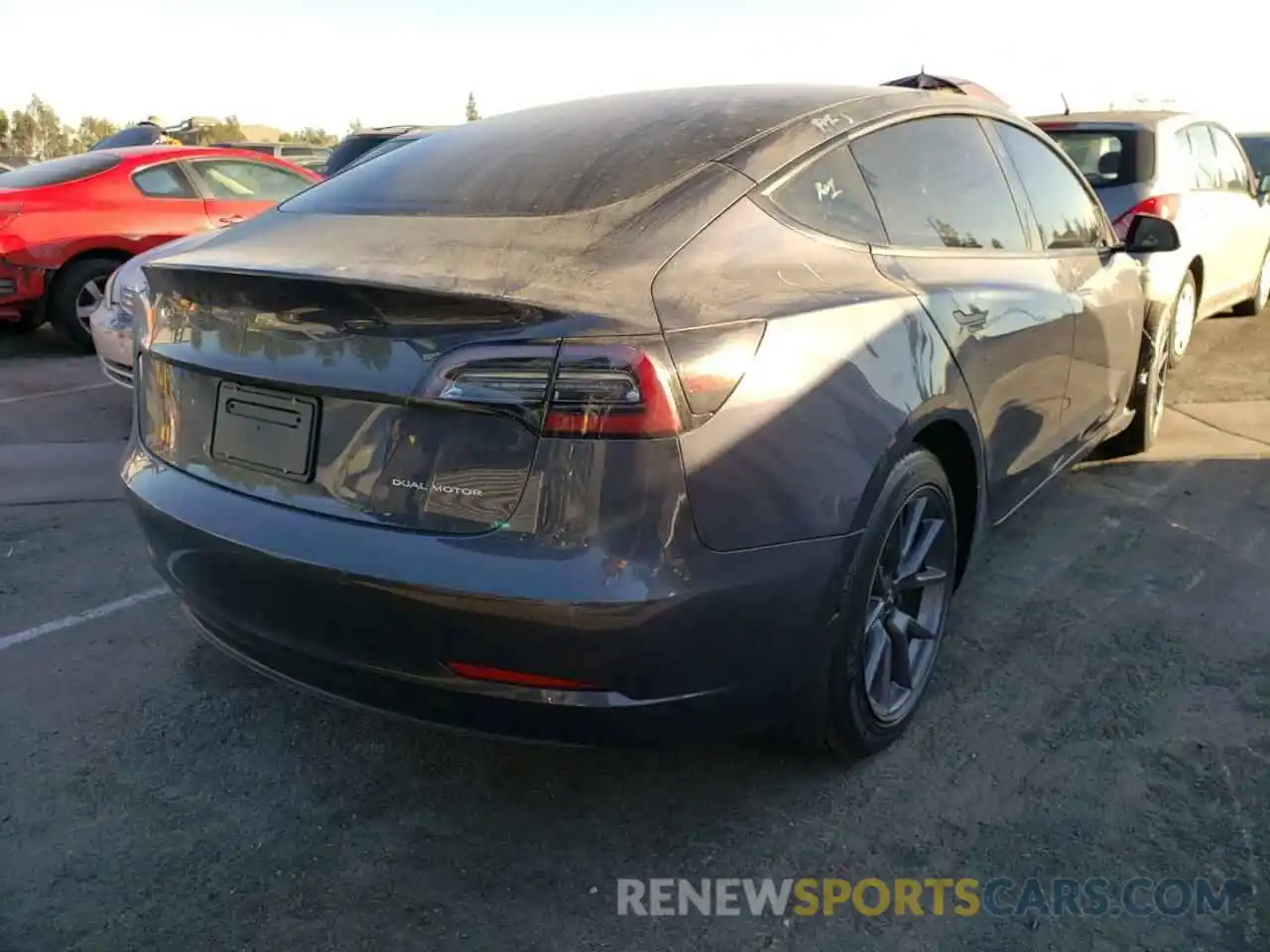 4 Photograph of a damaged car 5YJ3E1EB3MF072297 TESLA MODEL 3 2021