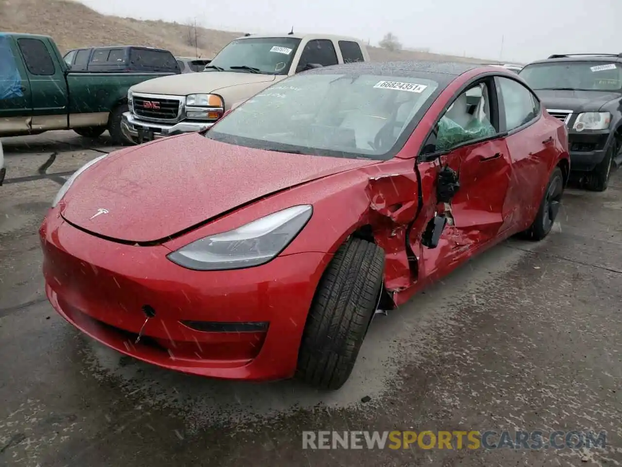 2 Photograph of a damaged car 5YJ3E1EB3MF086586 TESLA MODEL 3 2021