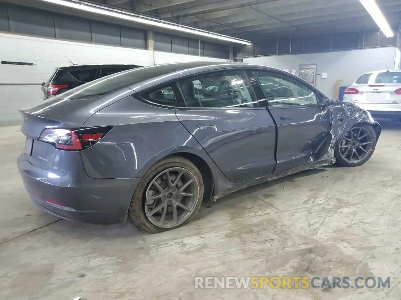 3 Photograph of a damaged car 5YJ3E1EB3MF848122 TESLA MODEL 3 2021