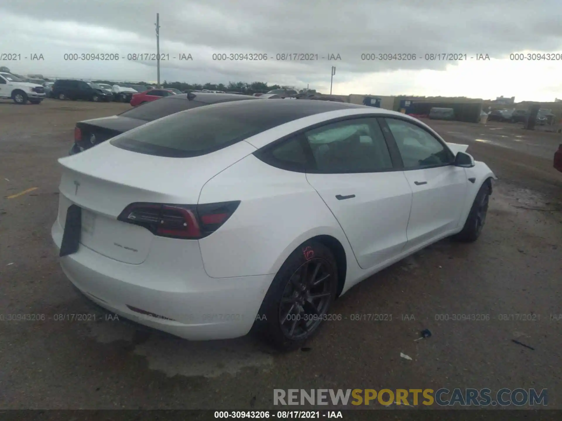 4 Photograph of a damaged car 5YJ3E1EB3MF852977 TESLA MODEL 3 2021