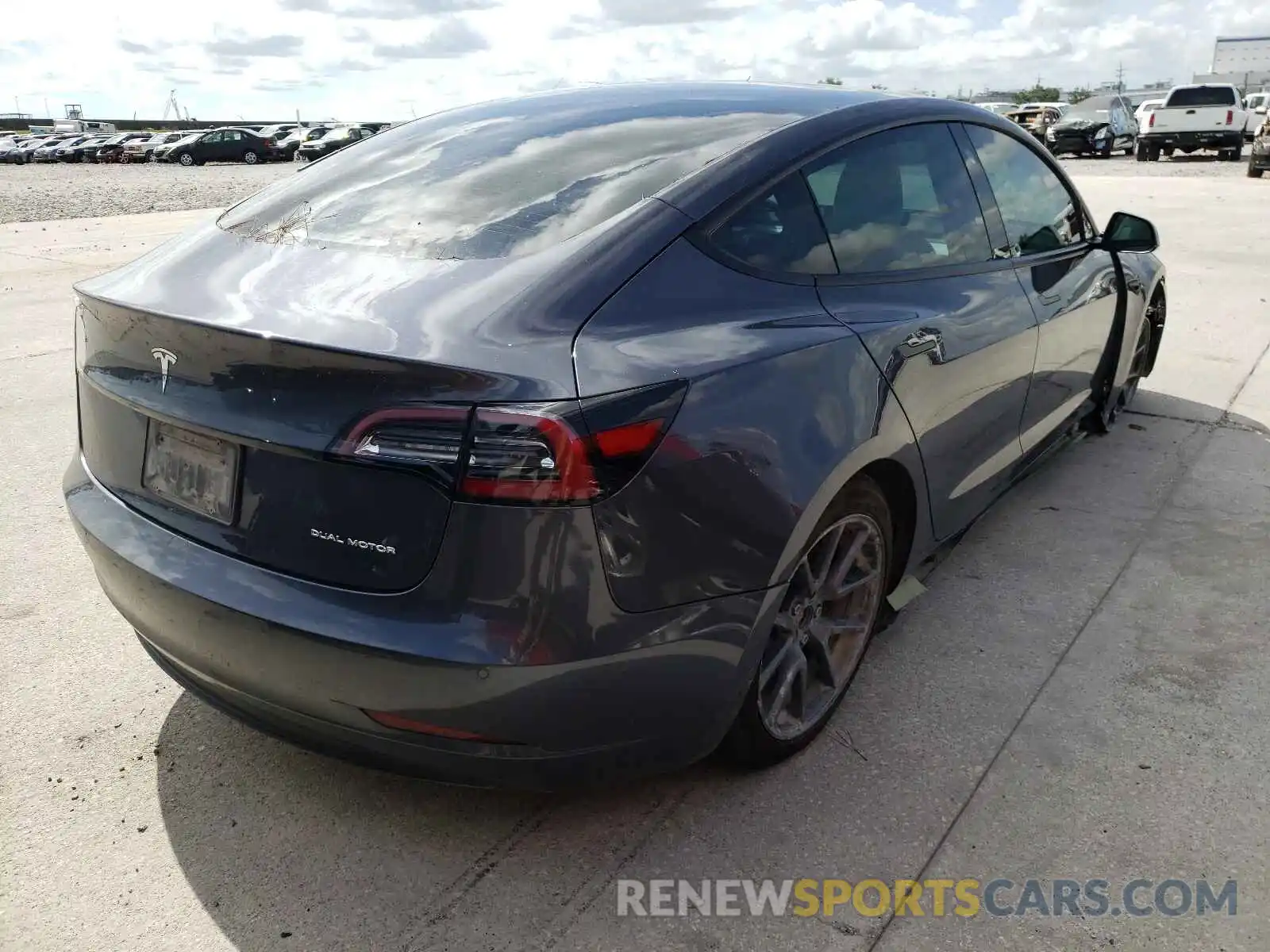 4 Photograph of a damaged car 5YJ3E1EB3MF858620 TESLA MODEL 3 2021