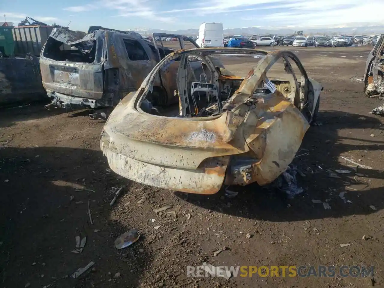 4 Photograph of a damaged car 5YJ3E1EB3MF874686 TESLA MODEL 3 2021