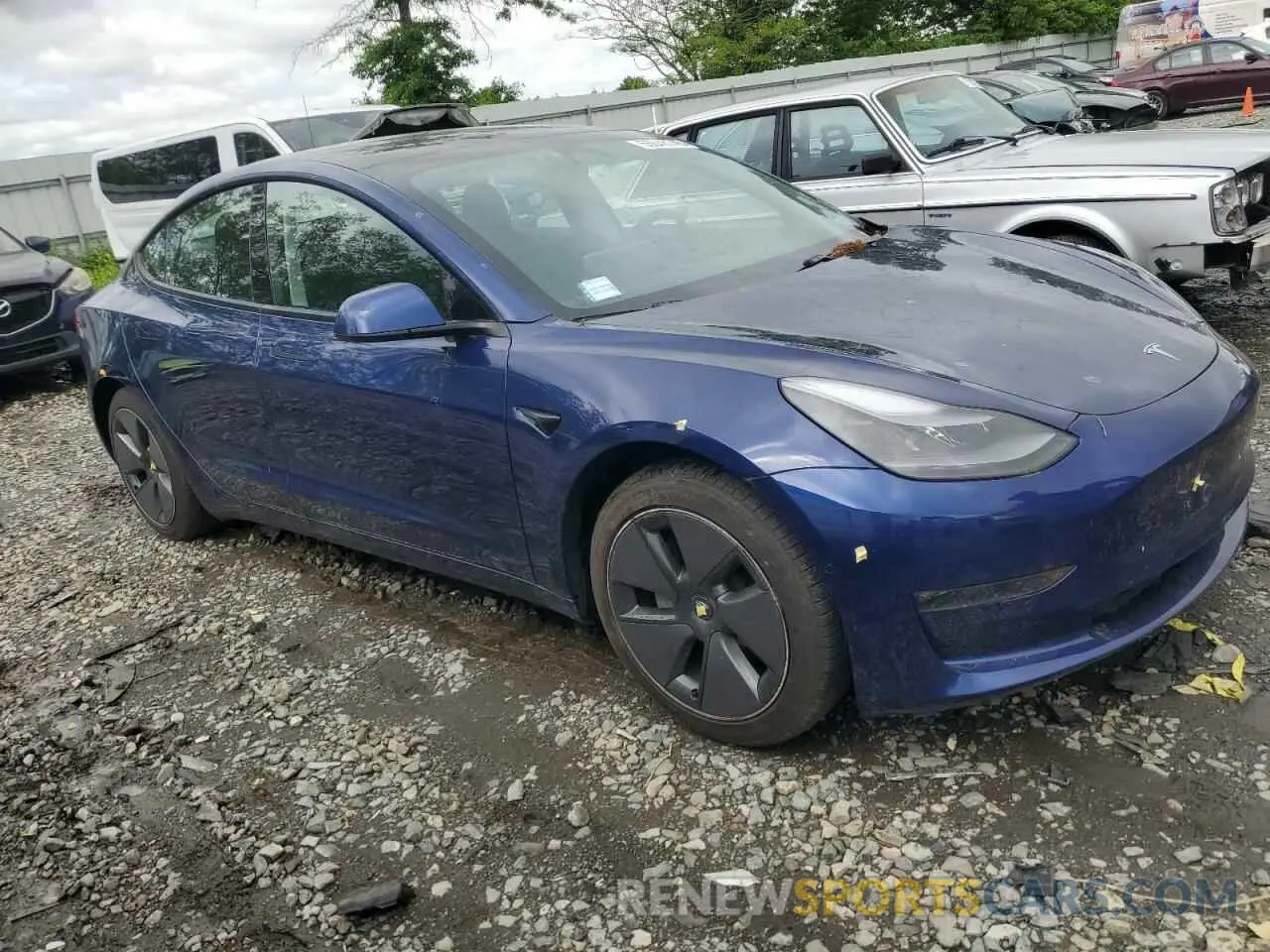4 Photograph of a damaged car 5YJ3E1EB3MF924468 TESLA MODEL 3 2021