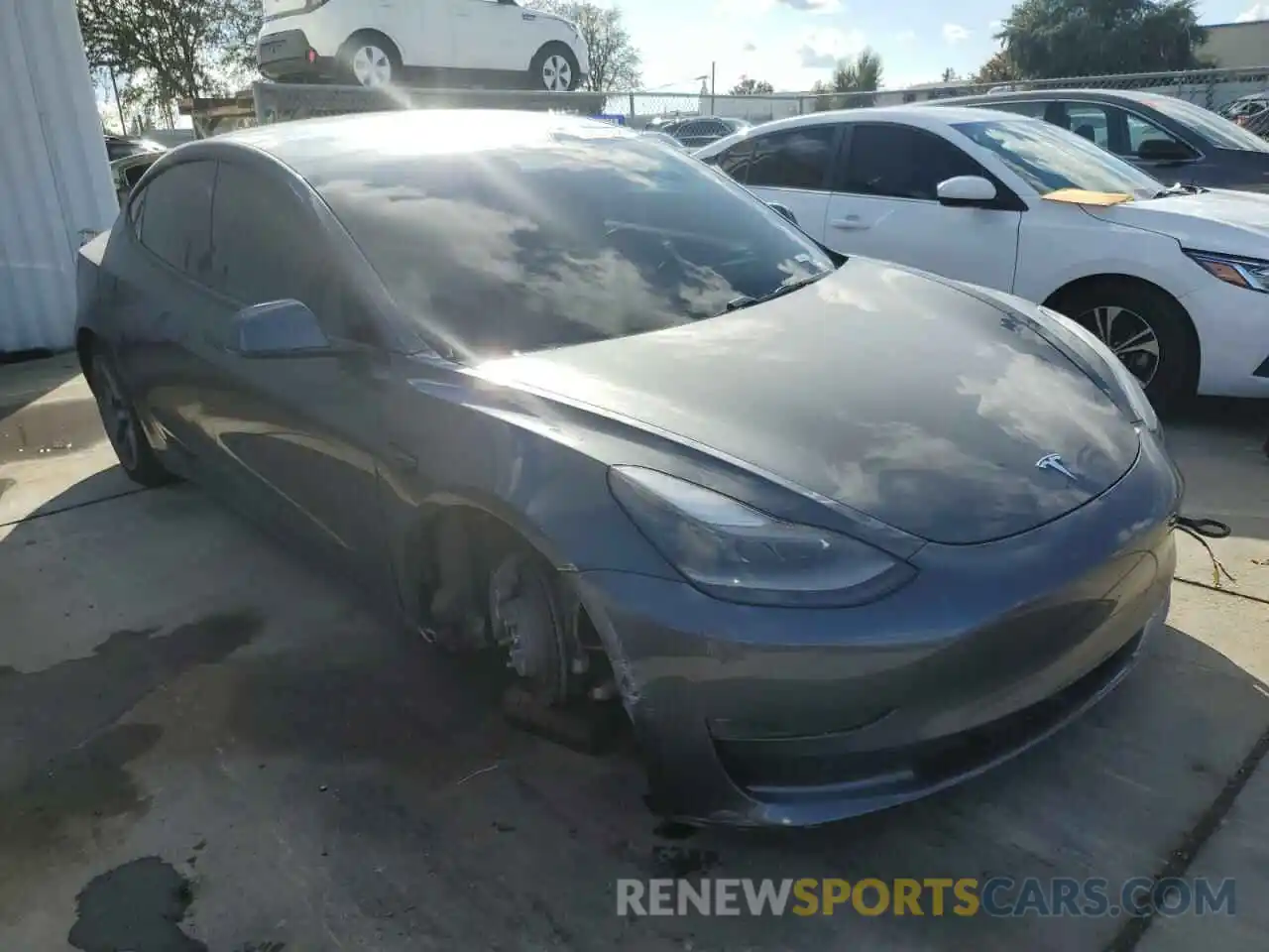 1 Photograph of a damaged car 5YJ3E1EB3MF939133 TESLA MODEL 3 2021