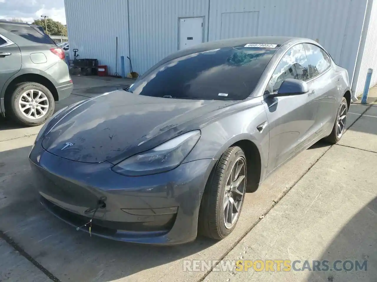 2 Photograph of a damaged car 5YJ3E1EB3MF939133 TESLA MODEL 3 2021