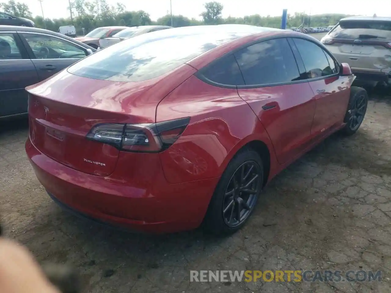 4 Photograph of a damaged car 5YJ3E1EB3MF973248 TESLA MODEL 3 2021