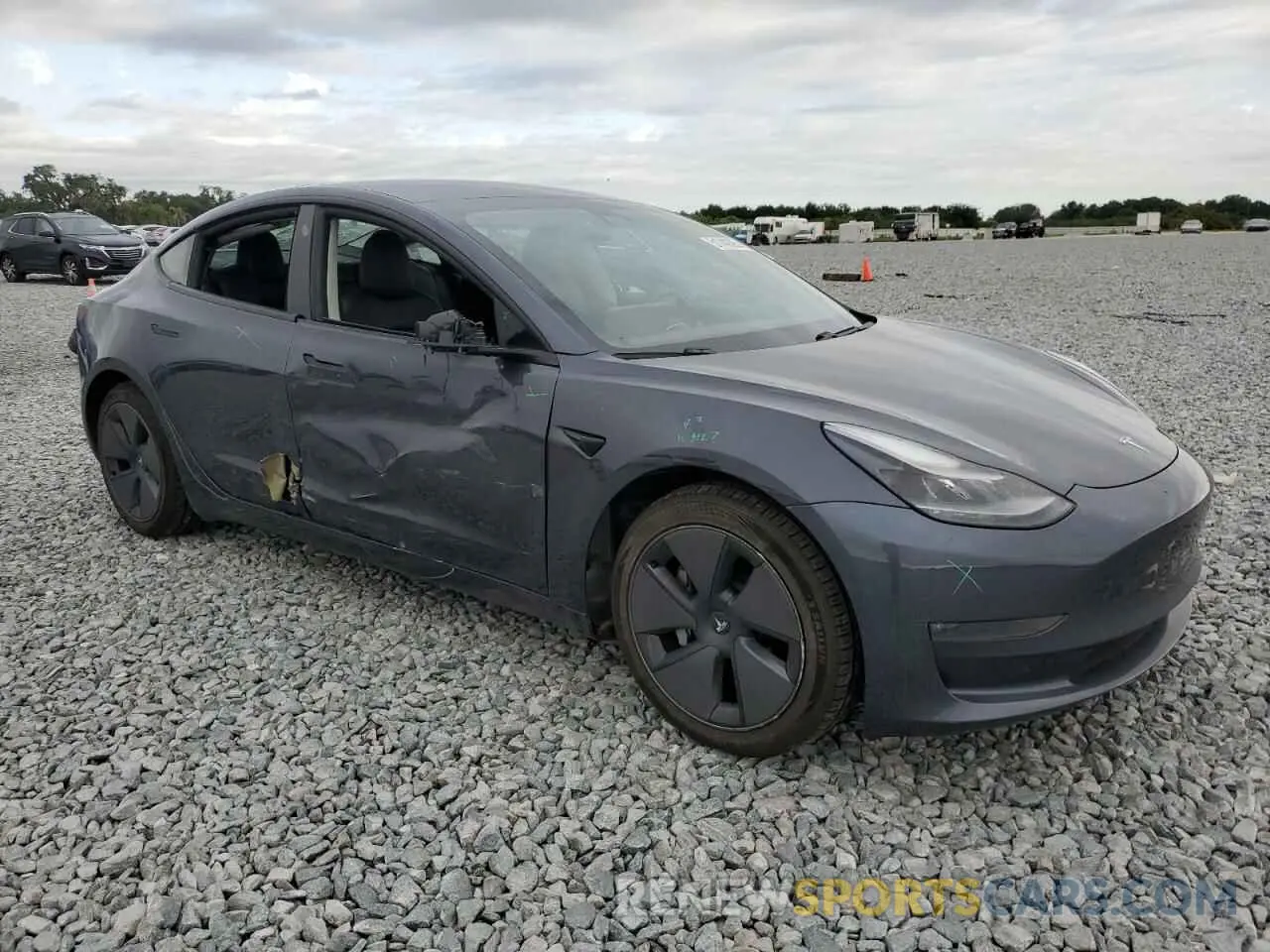 4 Photograph of a damaged car 5YJ3E1EB3MF978630 TESLA MODEL 3 2021