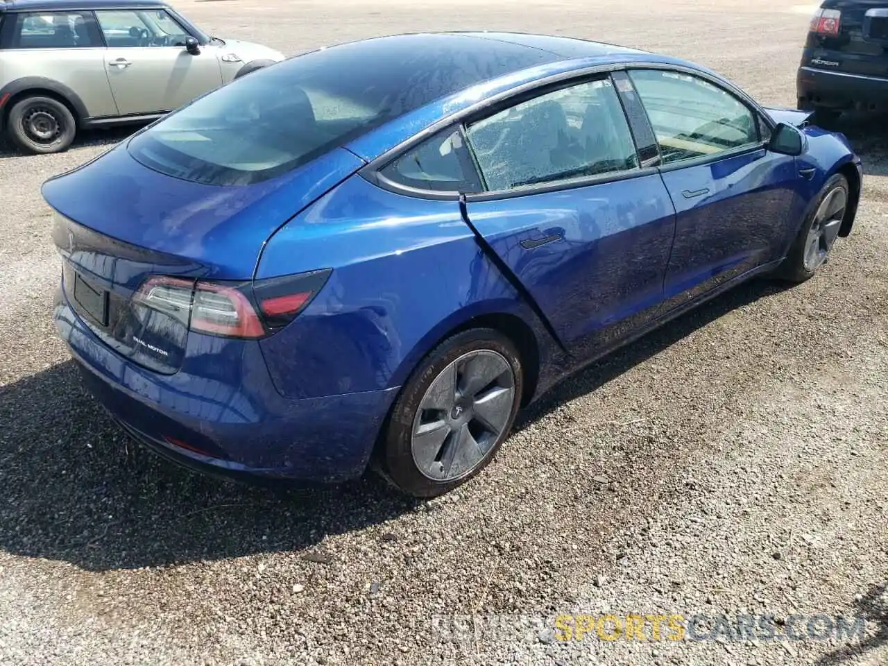 4 Photograph of a damaged car 5YJ3E1EB3MF979454 TESLA MODEL 3 2021