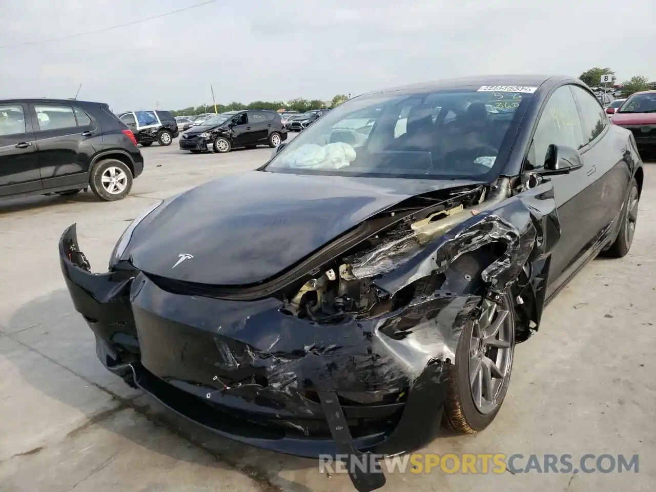 2 Photograph of a damaged car 5YJ3E1EB3MF992141 TESLA MODEL 3 2021