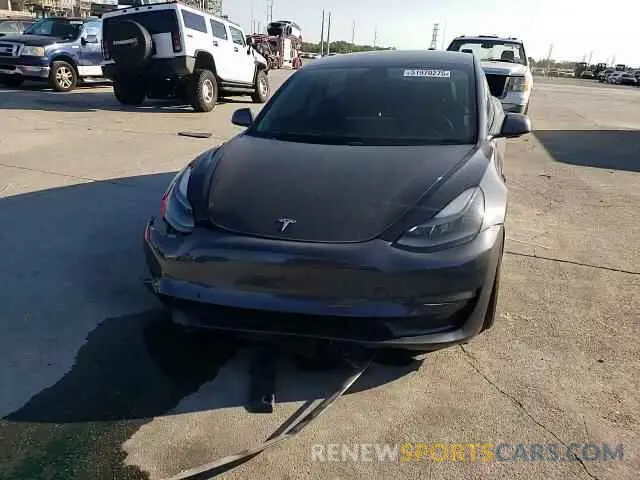 11 Photograph of a damaged car 5YJ3E1EB3MF998683 TESLA MODEL 3 2021