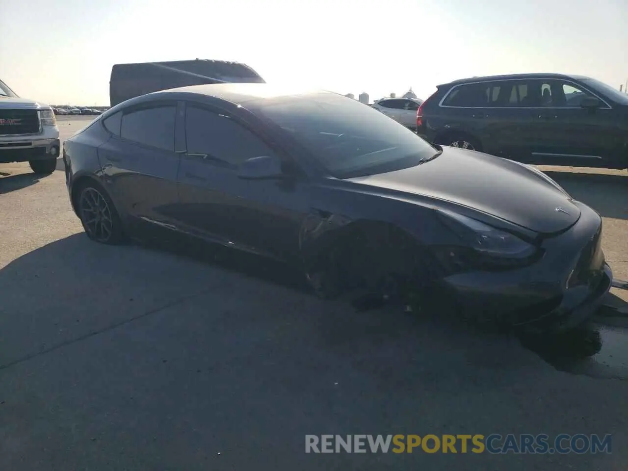 4 Photograph of a damaged car 5YJ3E1EB3MF998683 TESLA MODEL 3 2021
