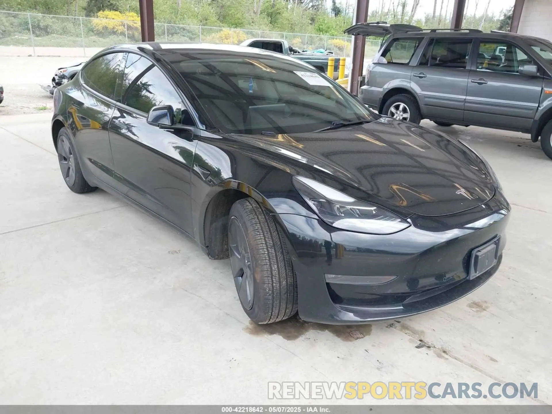 1 Photograph of a damaged car 5YJ3E1EB4MF002436 TESLA MODEL 3 2021
