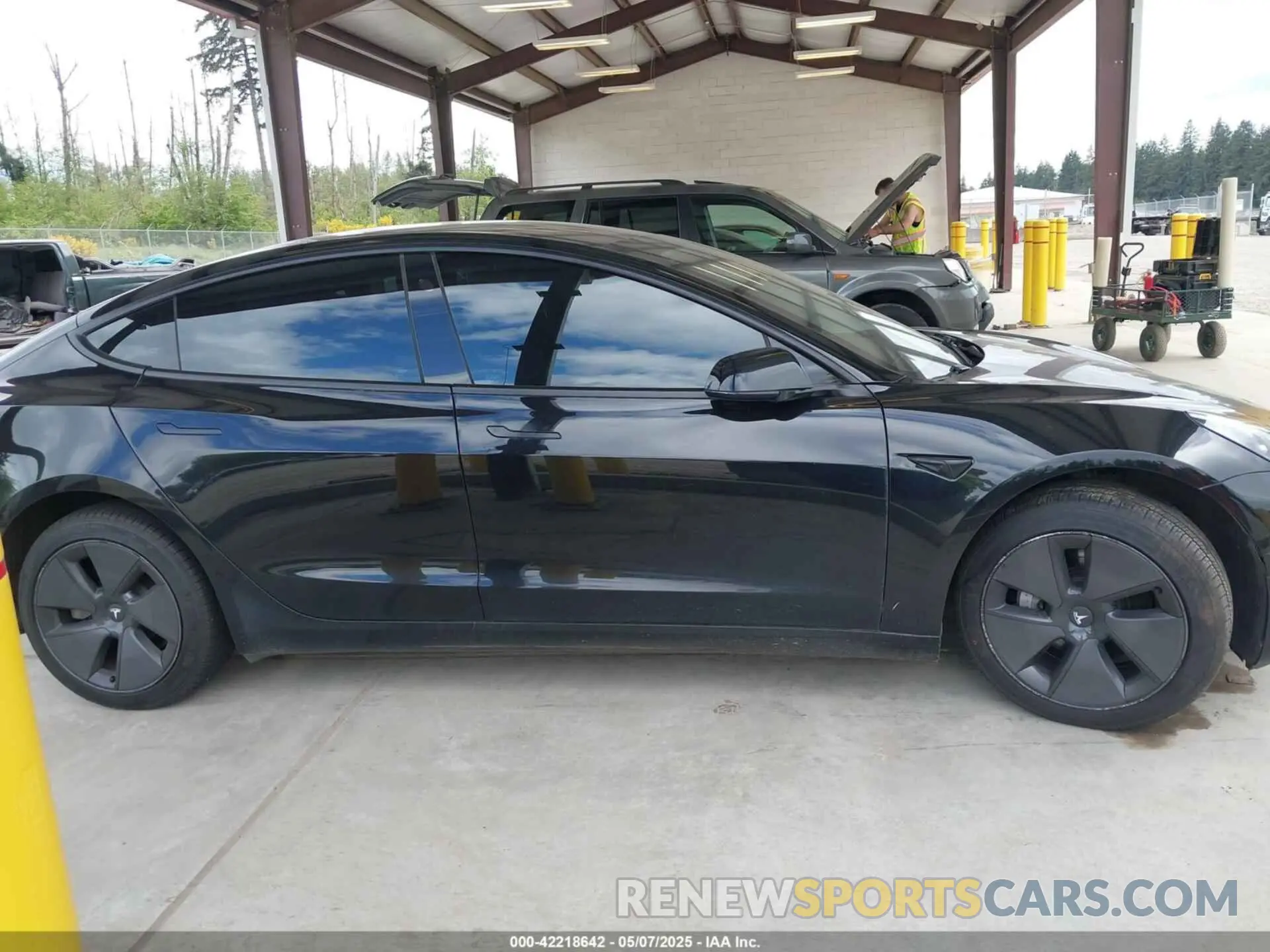 12 Photograph of a damaged car 5YJ3E1EB4MF002436 TESLA MODEL 3 2021