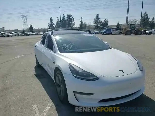 14 Photograph of a damaged car 5YJ3E1EB4MF002906 TESLA MODEL 3 2021