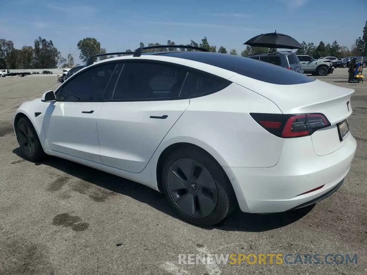 2 Photograph of a damaged car 5YJ3E1EB4MF002906 TESLA MODEL 3 2021