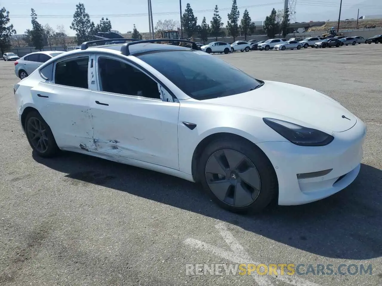 4 Photograph of a damaged car 5YJ3E1EB4MF002906 TESLA MODEL 3 2021