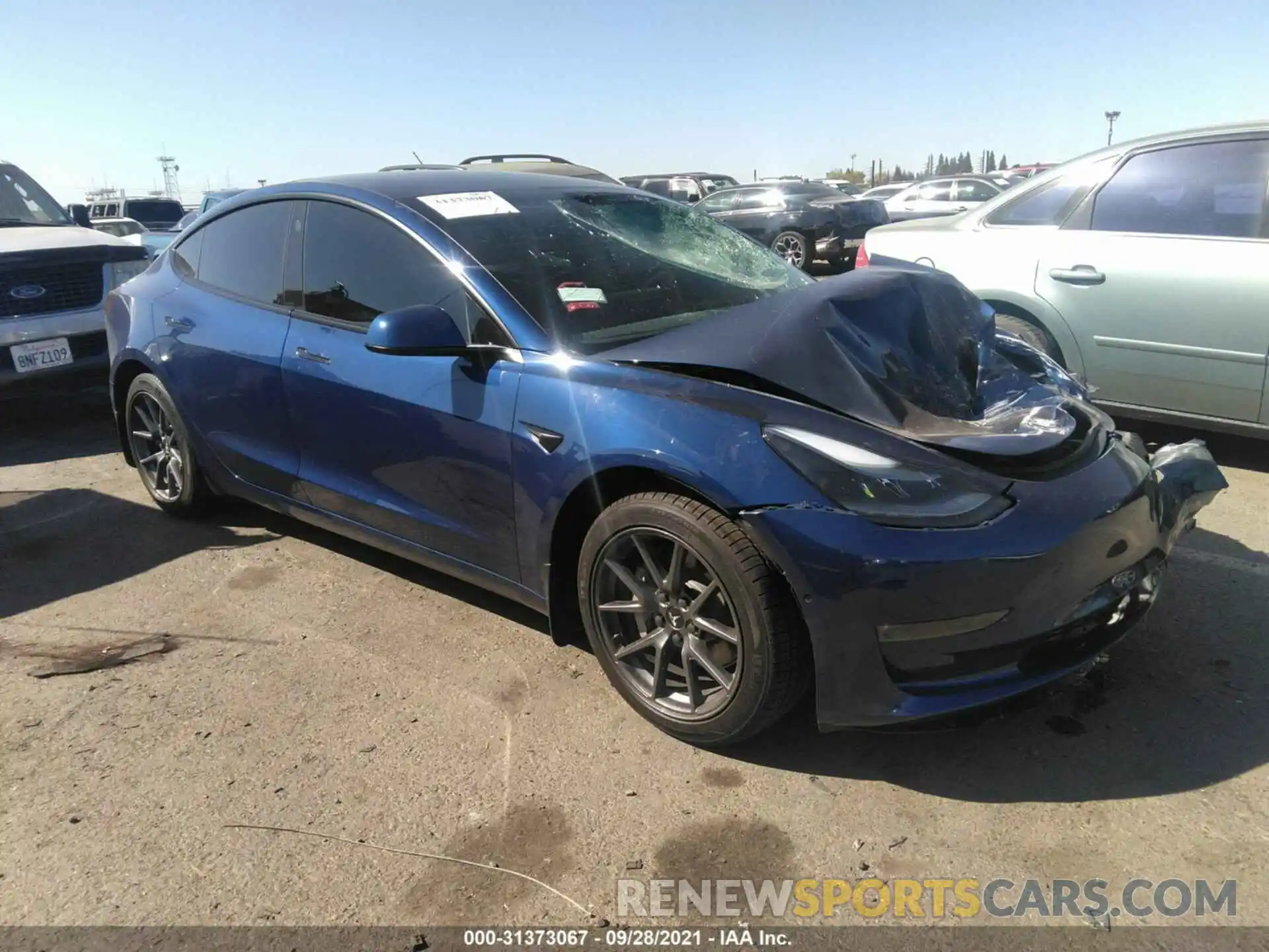 1 Photograph of a damaged car 5YJ3E1EB4MF045772 TESLA MODEL 3 2021