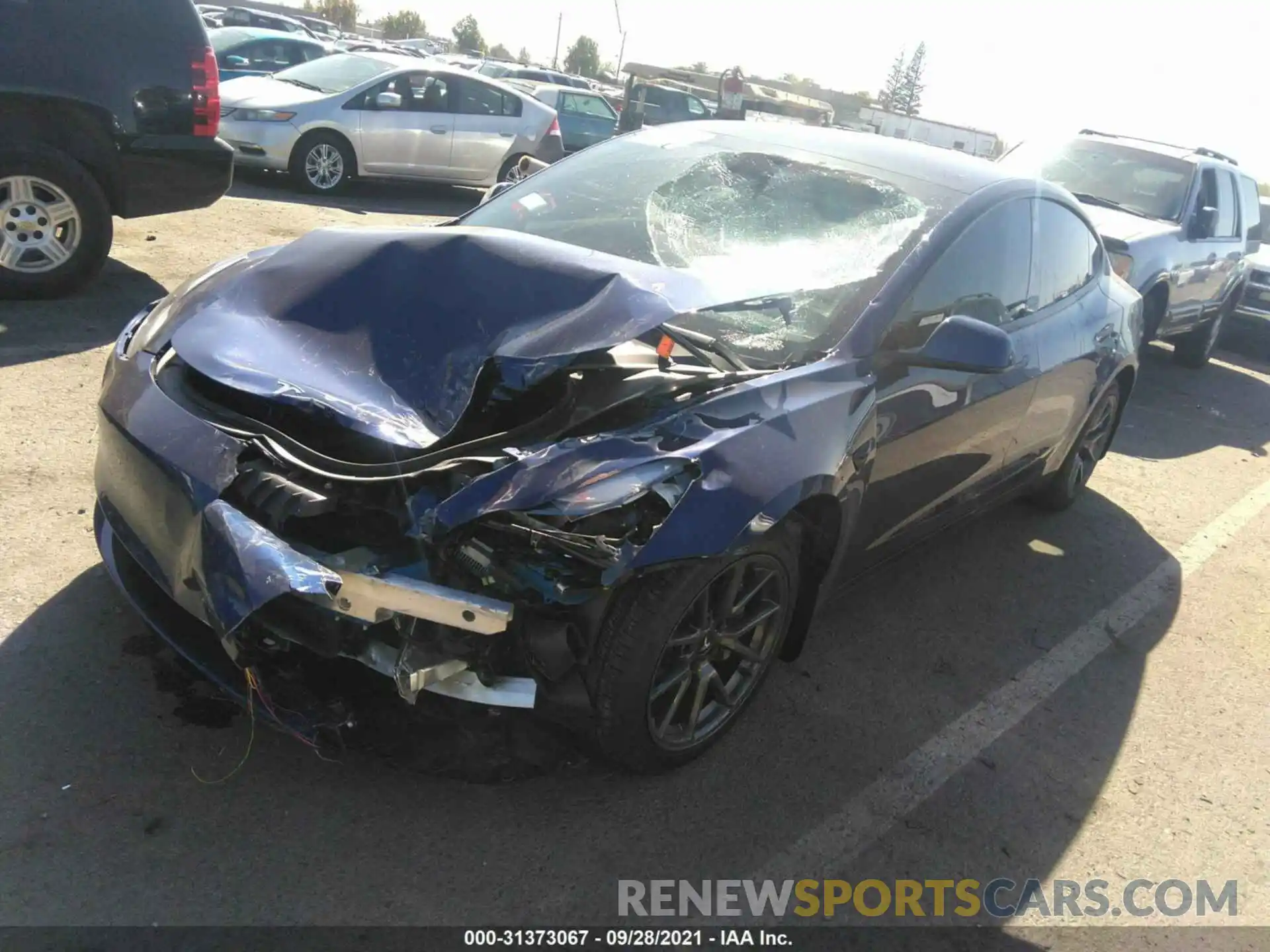 2 Photograph of a damaged car 5YJ3E1EB4MF045772 TESLA MODEL 3 2021