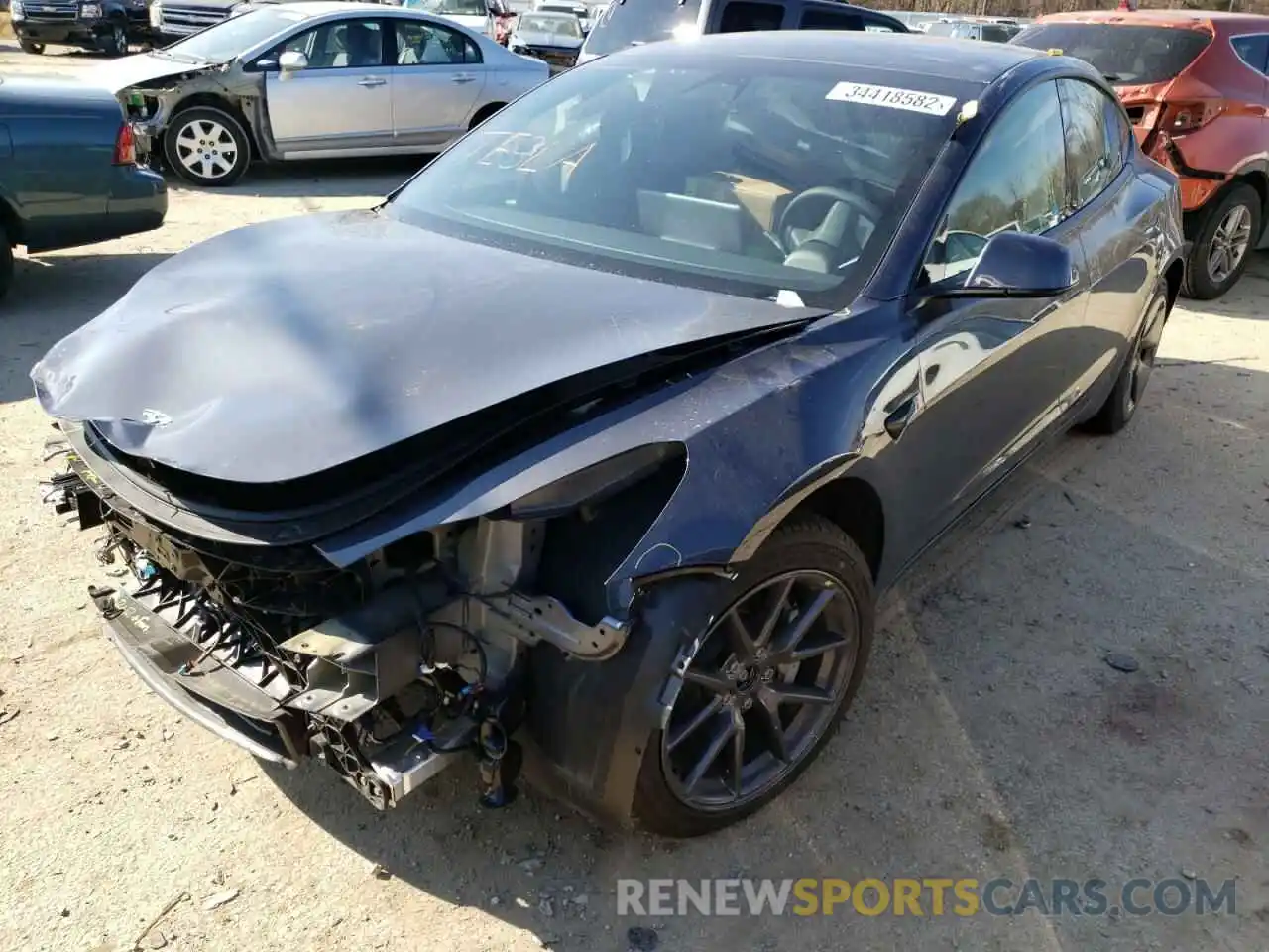 2 Photograph of a damaged car 5YJ3E1EB4MF059459 TESLA MODEL 3 2021