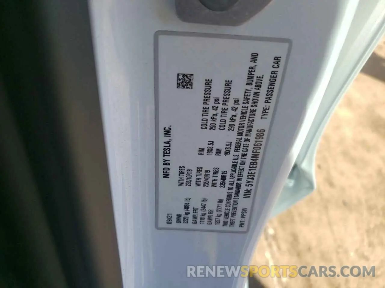 12 Photograph of a damaged car 5YJ3E1EB4MF061986 TESLA MODEL 3 2021