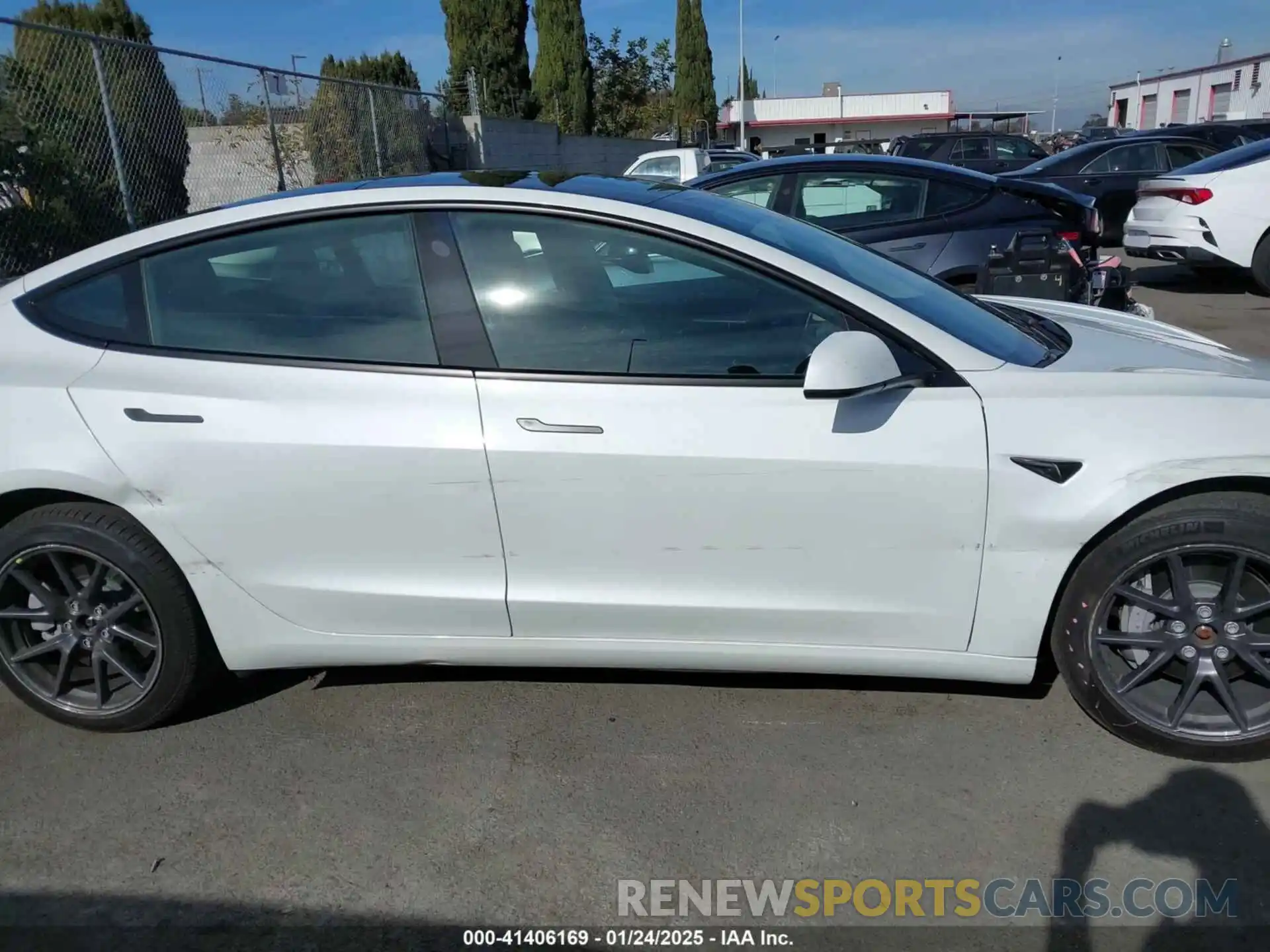 12 Photograph of a damaged car 5YJ3E1EB4MF072972 TESLA MODEL 3 2021