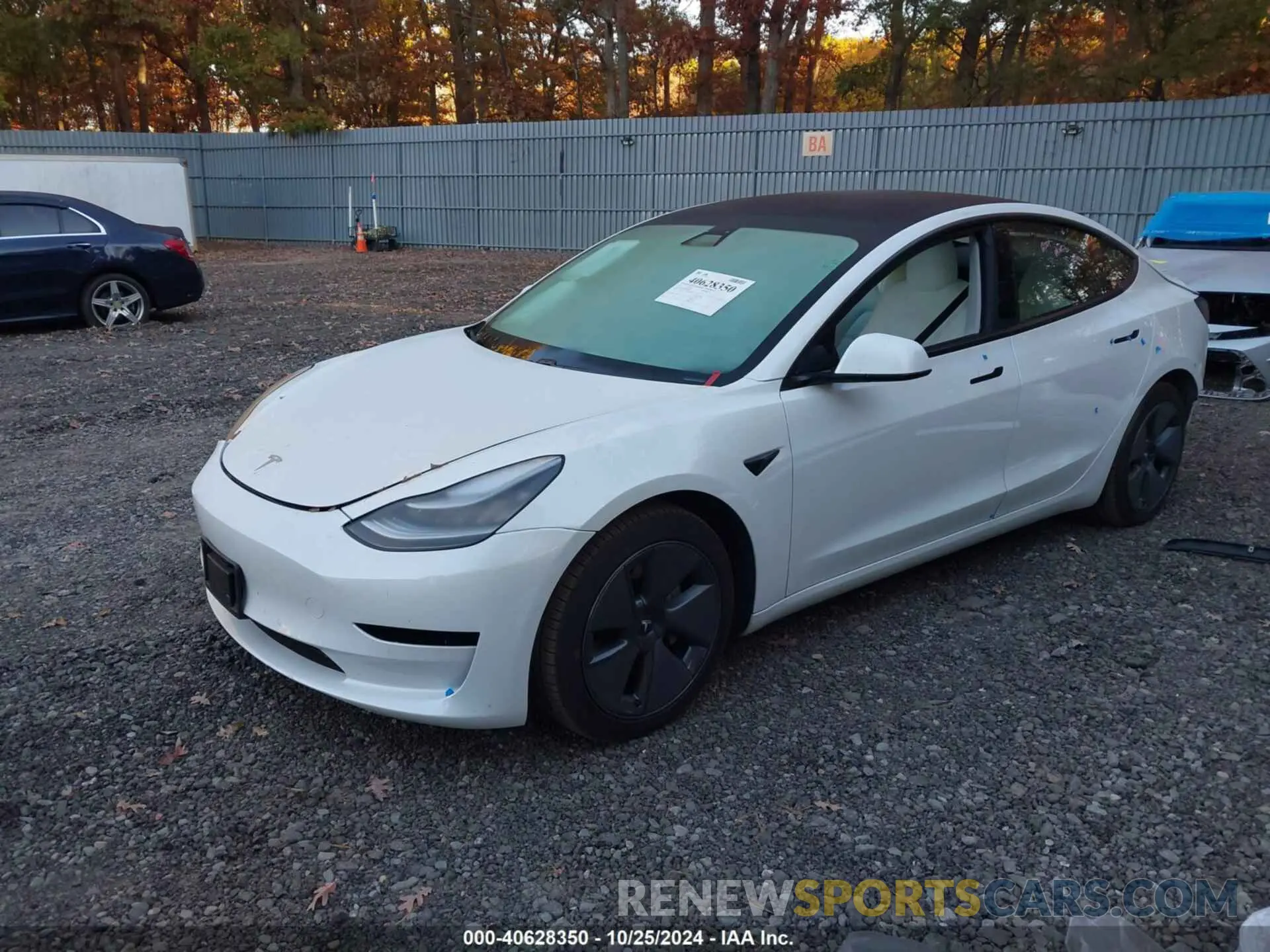 2 Photograph of a damaged car 5YJ3E1EB4MF855158 TESLA MODEL 3 2021
