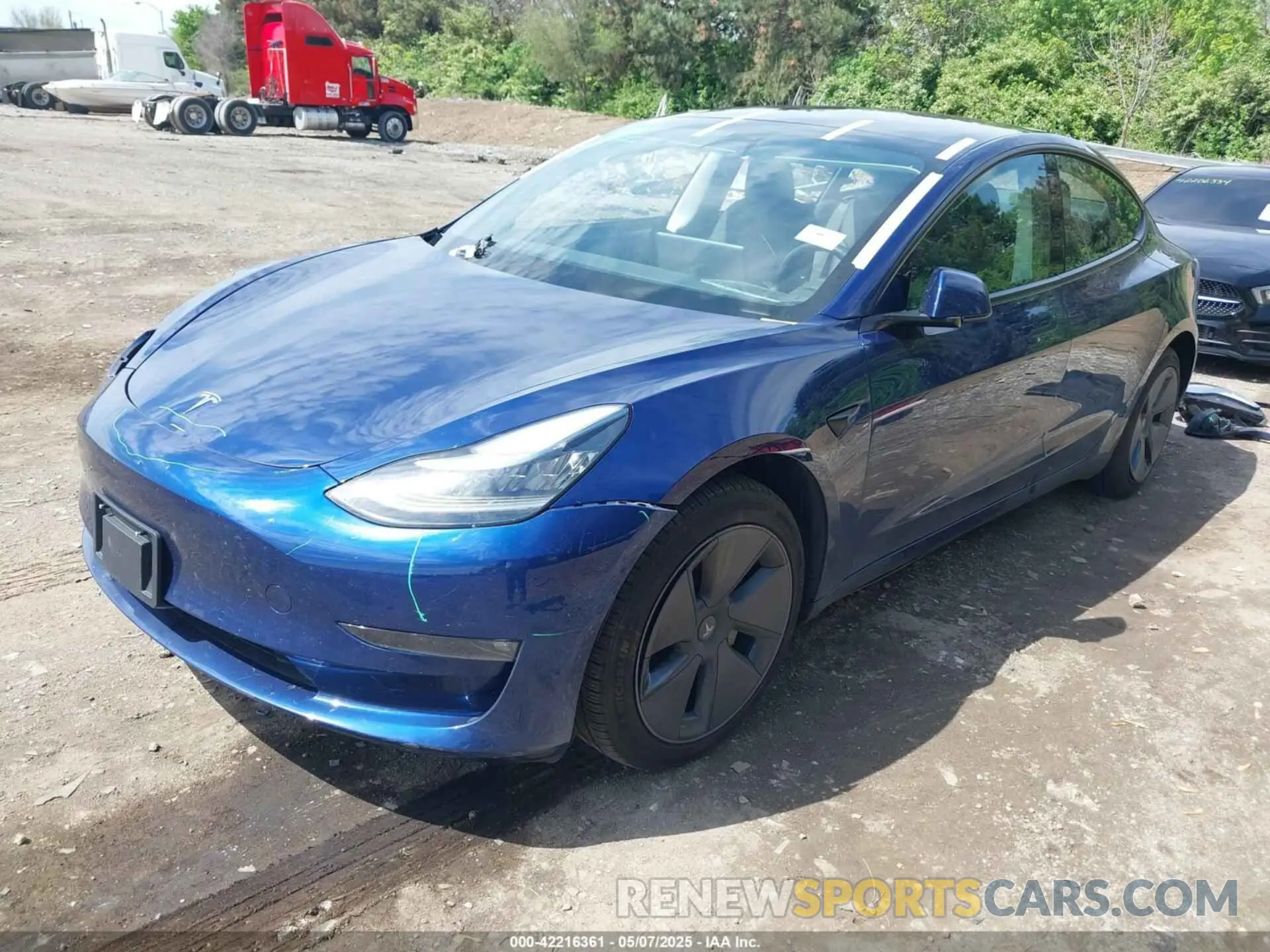 2 Photograph of a damaged car 5YJ3E1EB4MF858187 TESLA MODEL 3 2021
