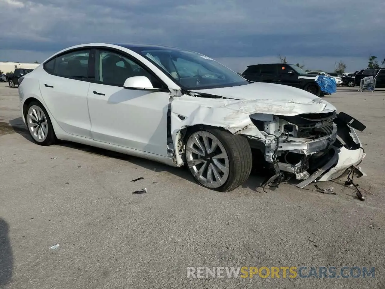 4 Photograph of a damaged car 5YJ3E1EB4MF859887 TESLA MODEL 3 2021